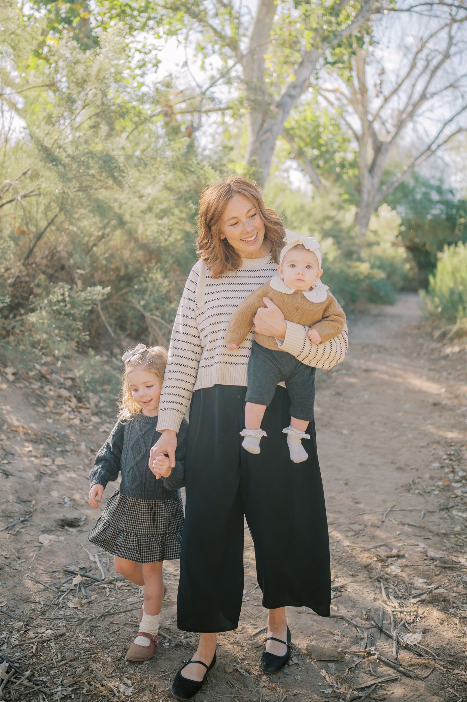 Luxury Gilbert Arizona family photography surrounded by lush greenery. A relaxed, stress-free experience that captures real connection.