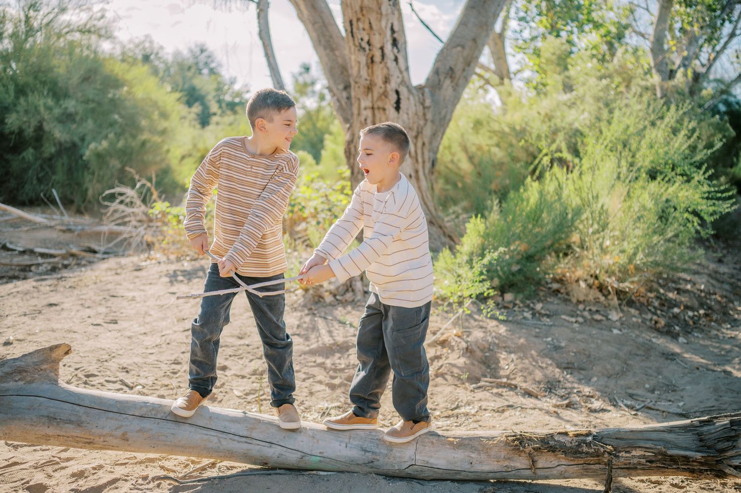 Luxury Gilbert Arizona family photography surrounded by lush greenery. A relaxed, stress-free experience that captures real connection.