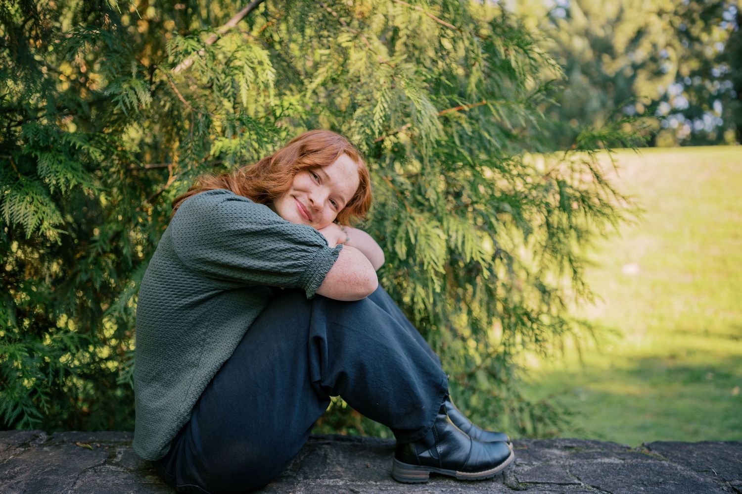Phoenix Arizona senior photographer. Senior girl sitting outside in nature.