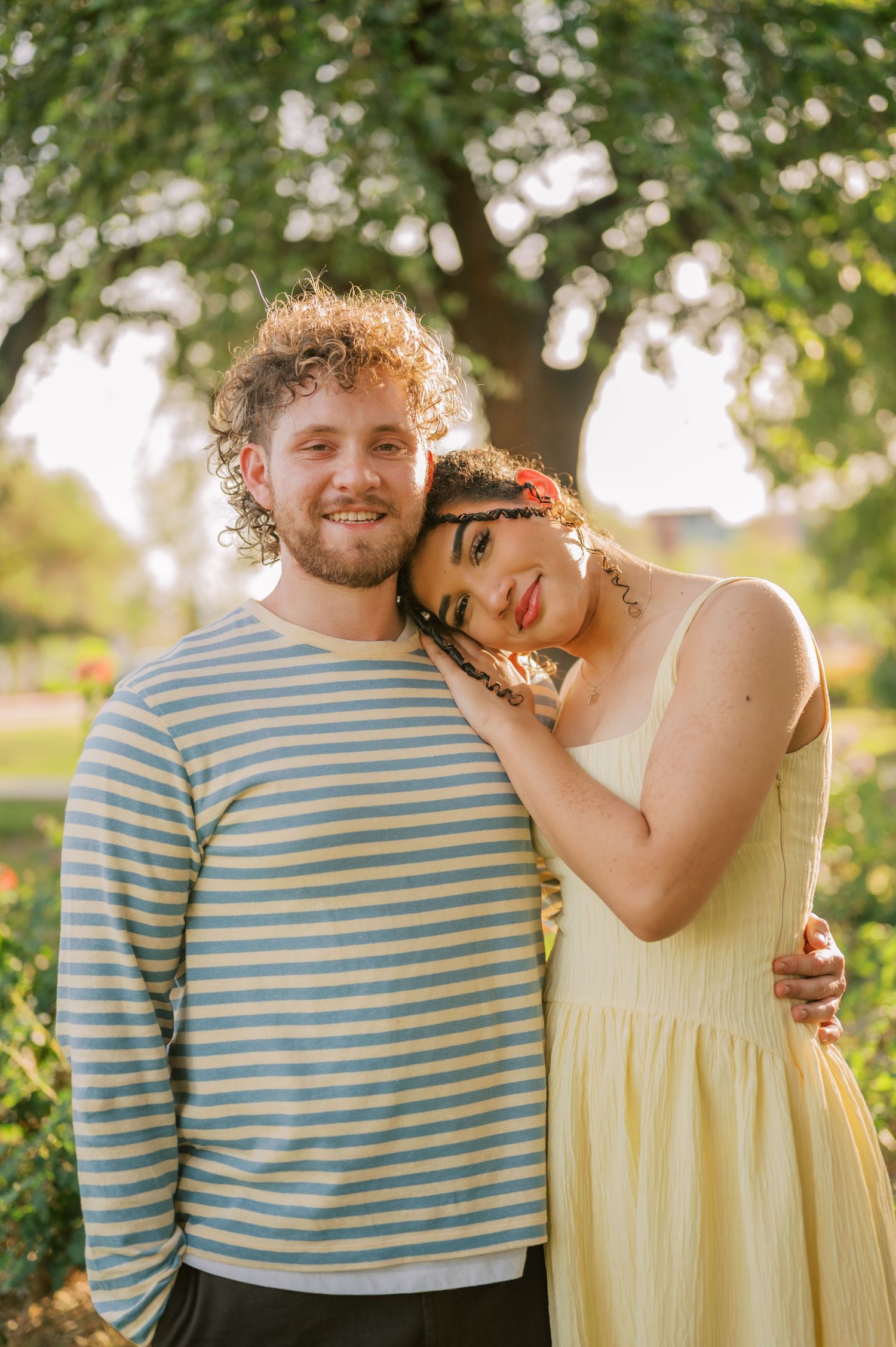 Arizona family photographer capturing moments in rose garden setting