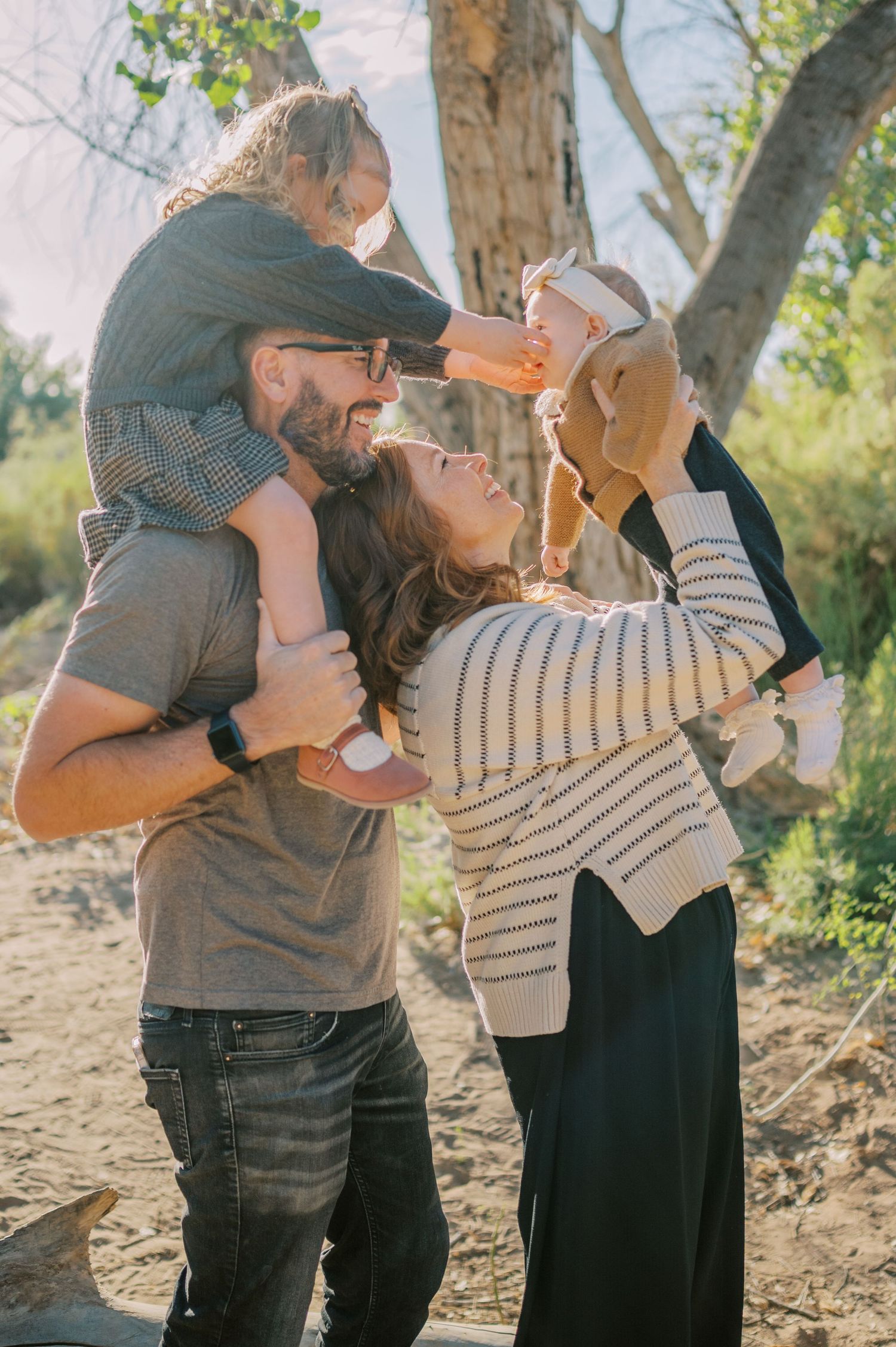 Luxury Gilbert Arizona family photography surrounded by lush greenery. A relaxed, stress-free experience that captures real connection.
