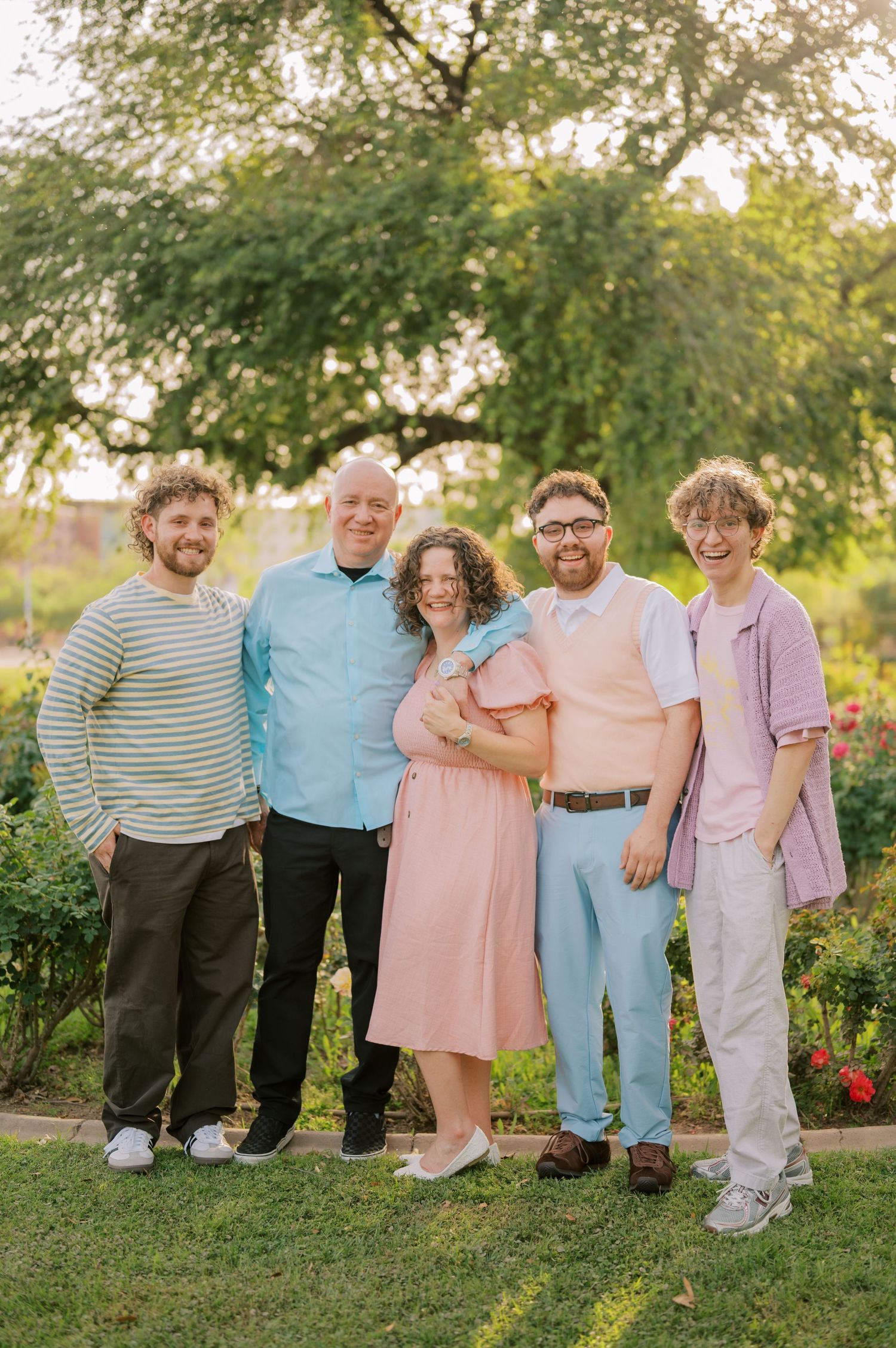 Luxury family photography session in a colorful rose garden Phoenix Arizona