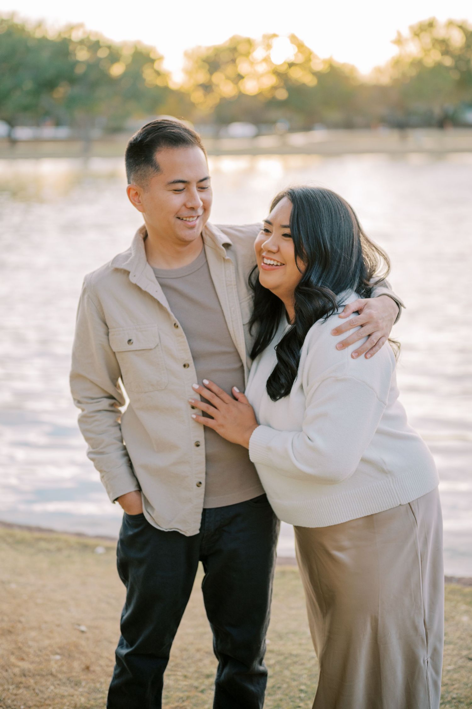 A couple shares tender moments together in a series of casual outdoor photos at sunset. Phoenix Arizona couples photographer.