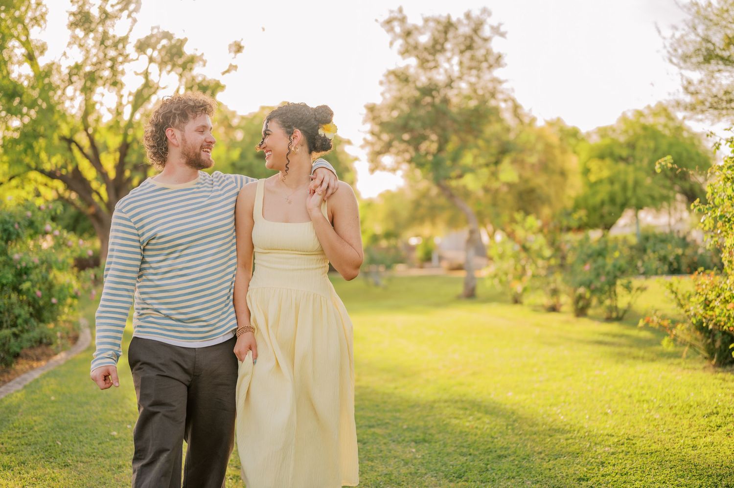 Luxury engagement photography session in a colorful rose garden Phoenix Arizona