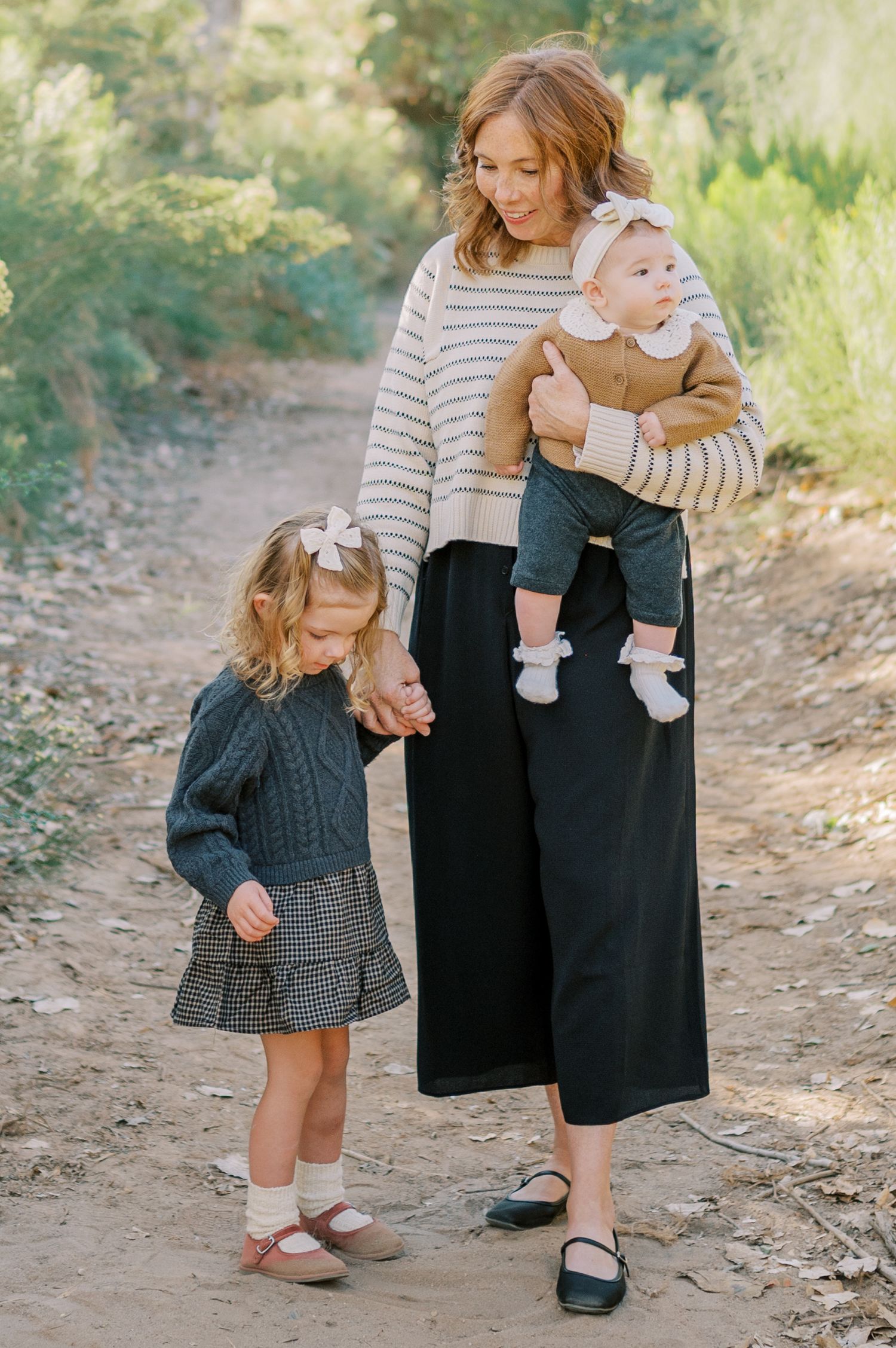 Luxury Gilbert Arizona family photography surrounded by lush greenery. A relaxed, stress-free experience that captures real connection.