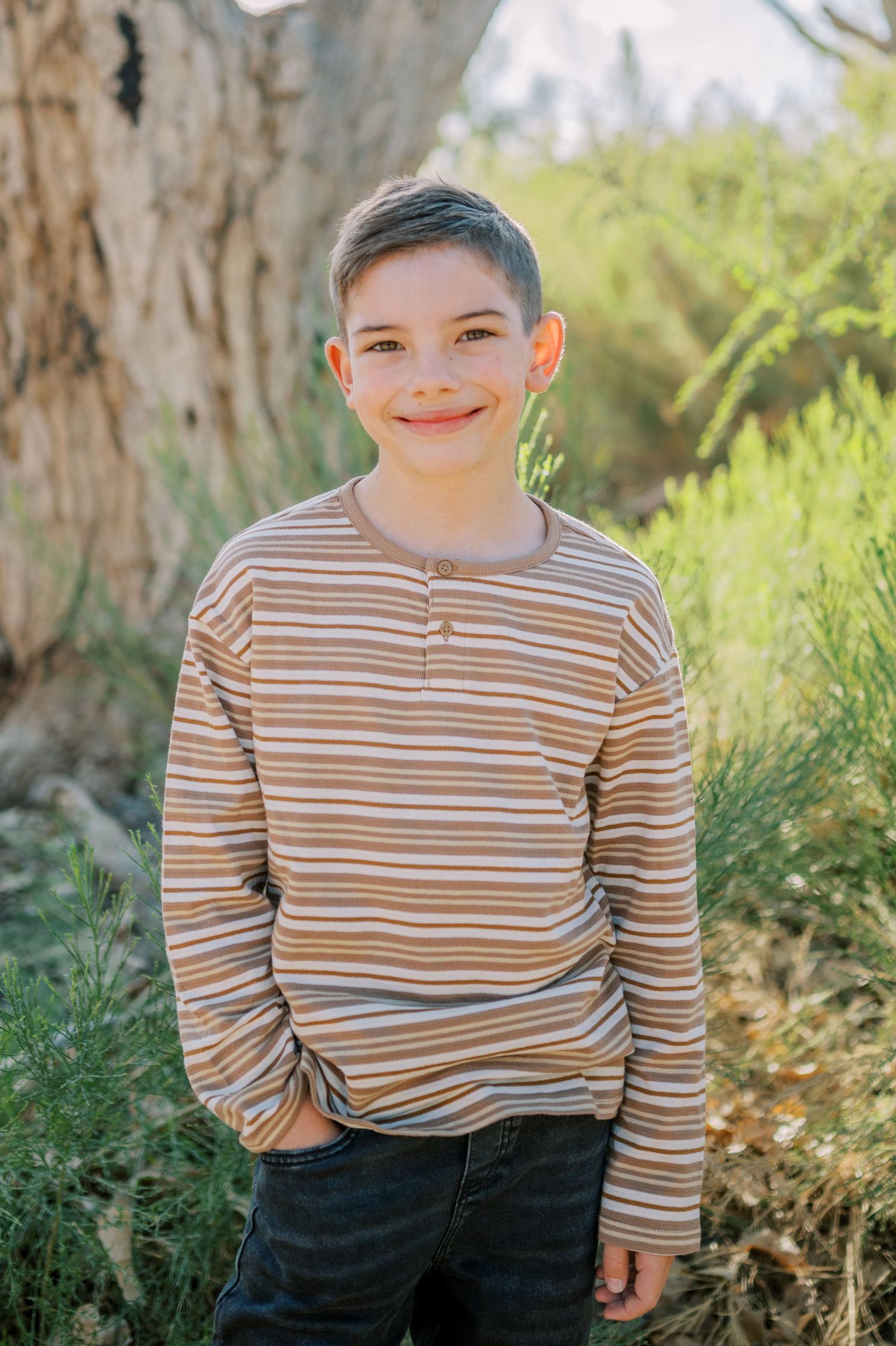 Luxury Gilbert Arizona family photography surrounded by lush greenery. A relaxed, stress-free experience that captures real connection.