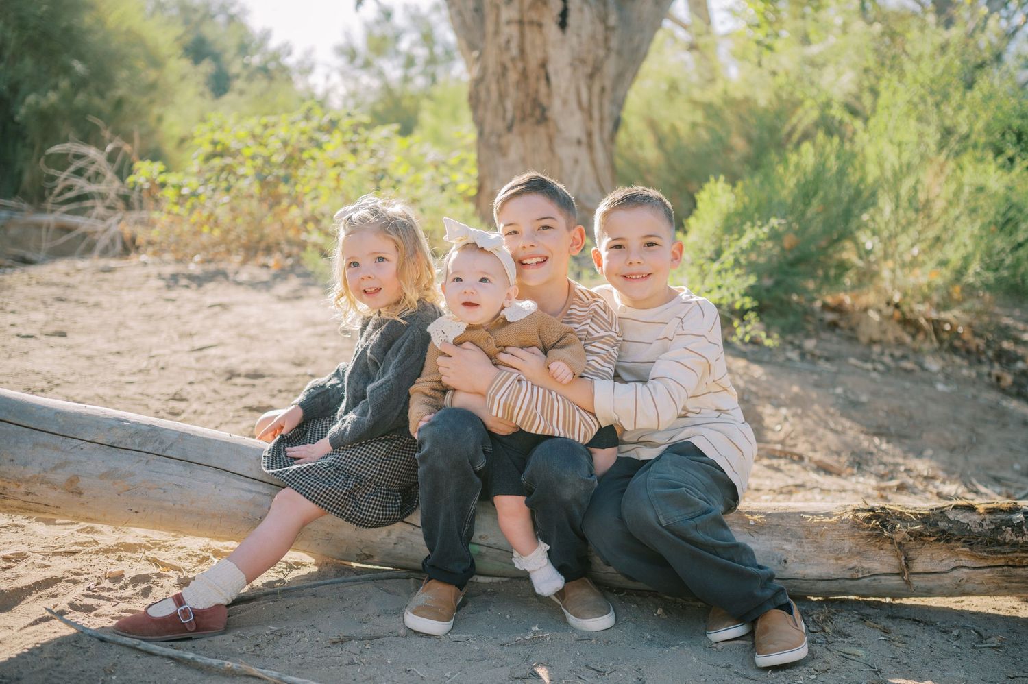 Luxury Gilbert Arizona family photography surrounded by lush greenery. A relaxed, stress-free experience that captures real connection.