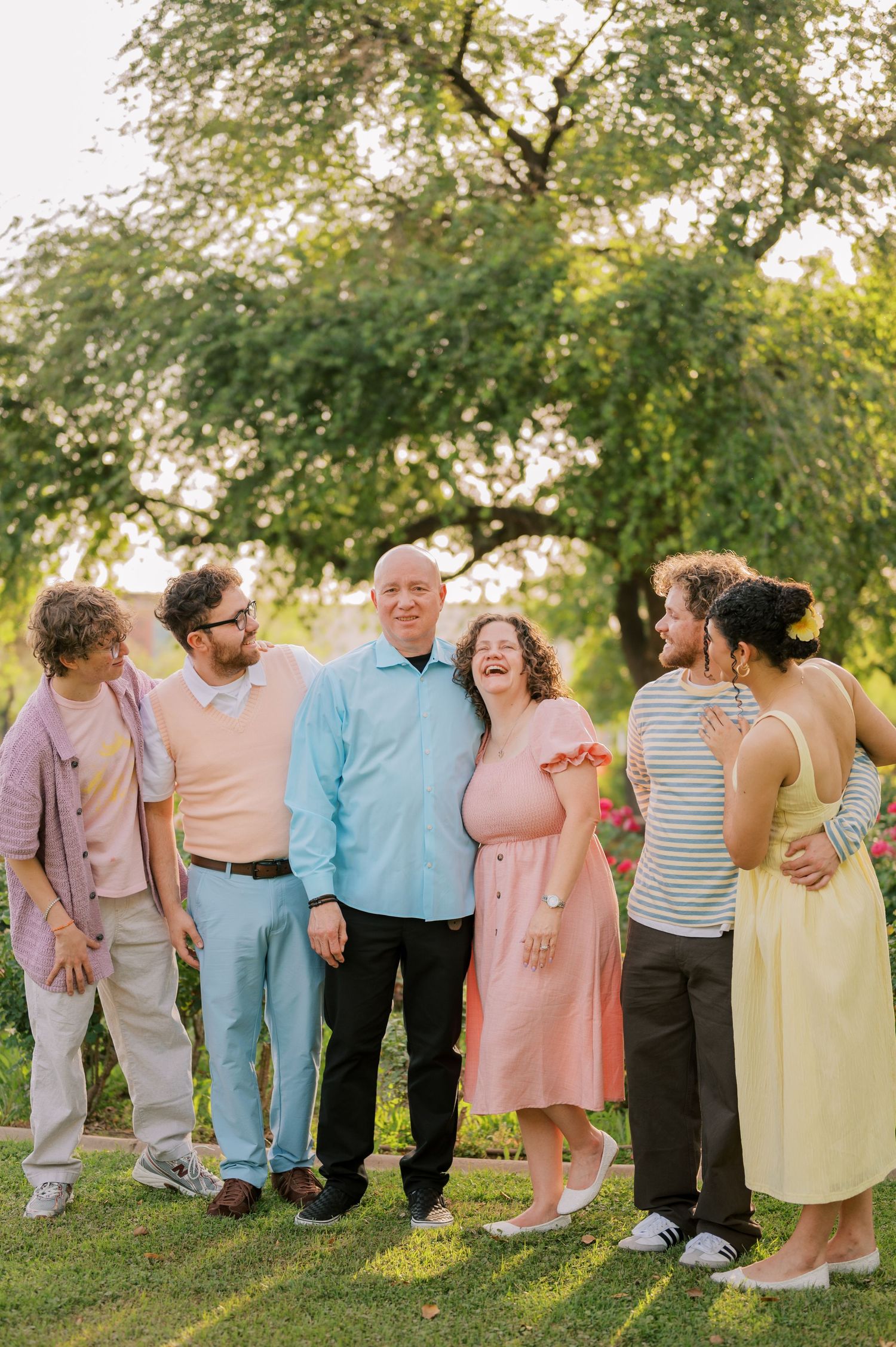 Arizona family photographer capturing moments in rose garden setting