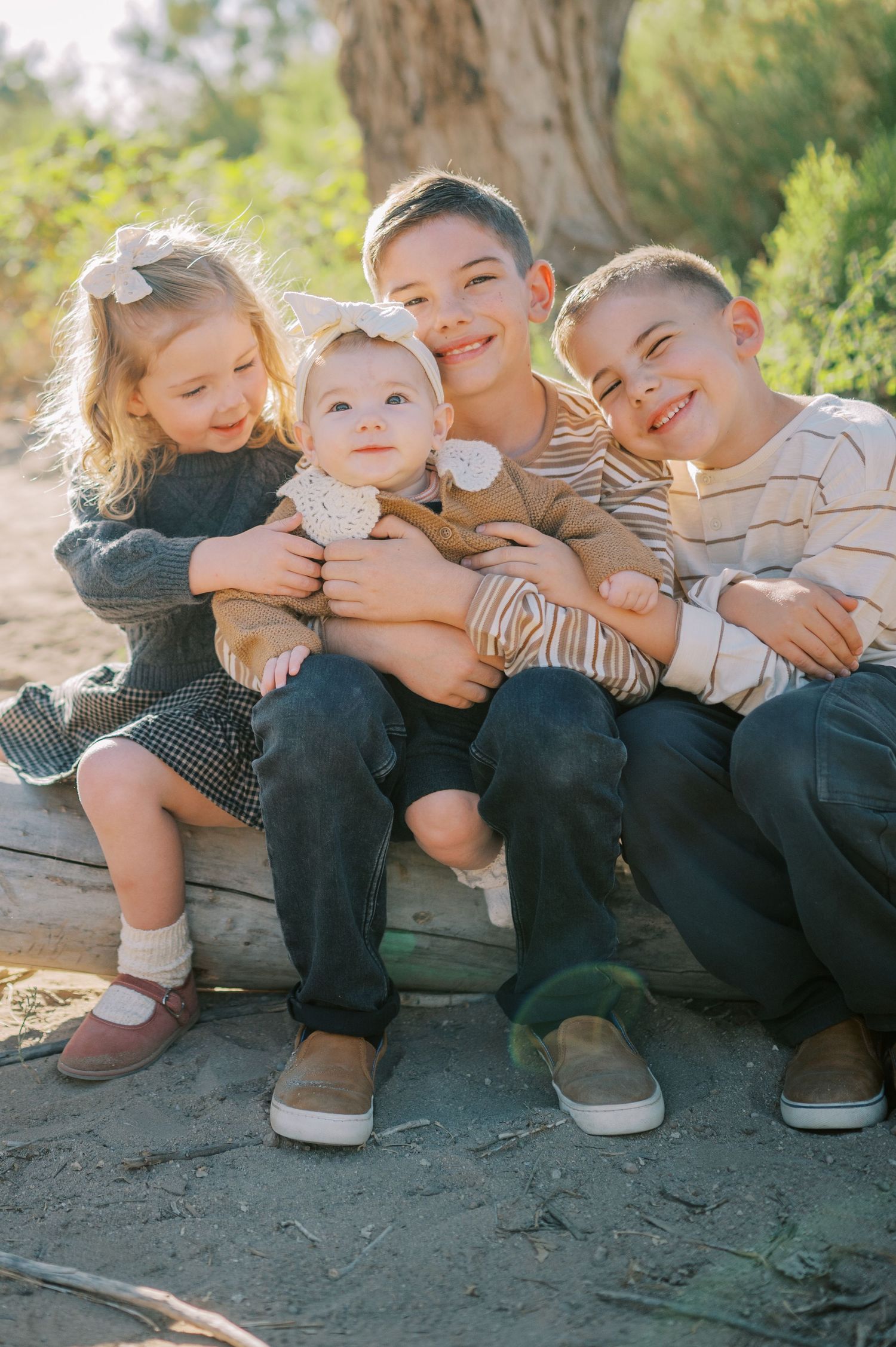 Luxury Gilbert Arizona family photography surrounded by lush greenery. A relaxed, stress-free experience that captures real connection.