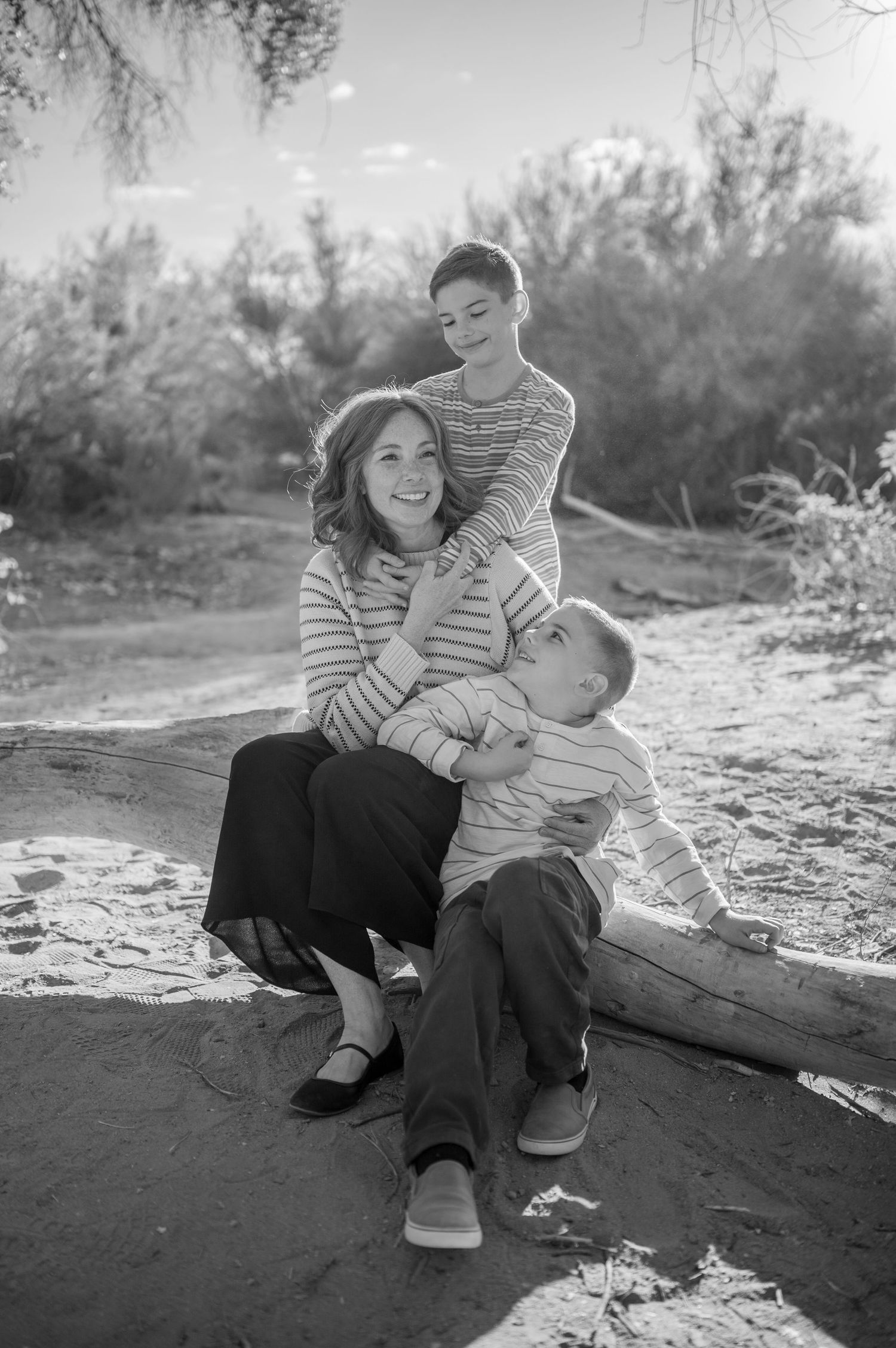 Luxury Gilbert Arizona family photography surrounded by lush greenery. A relaxed, stress-free experience that captures real connection.