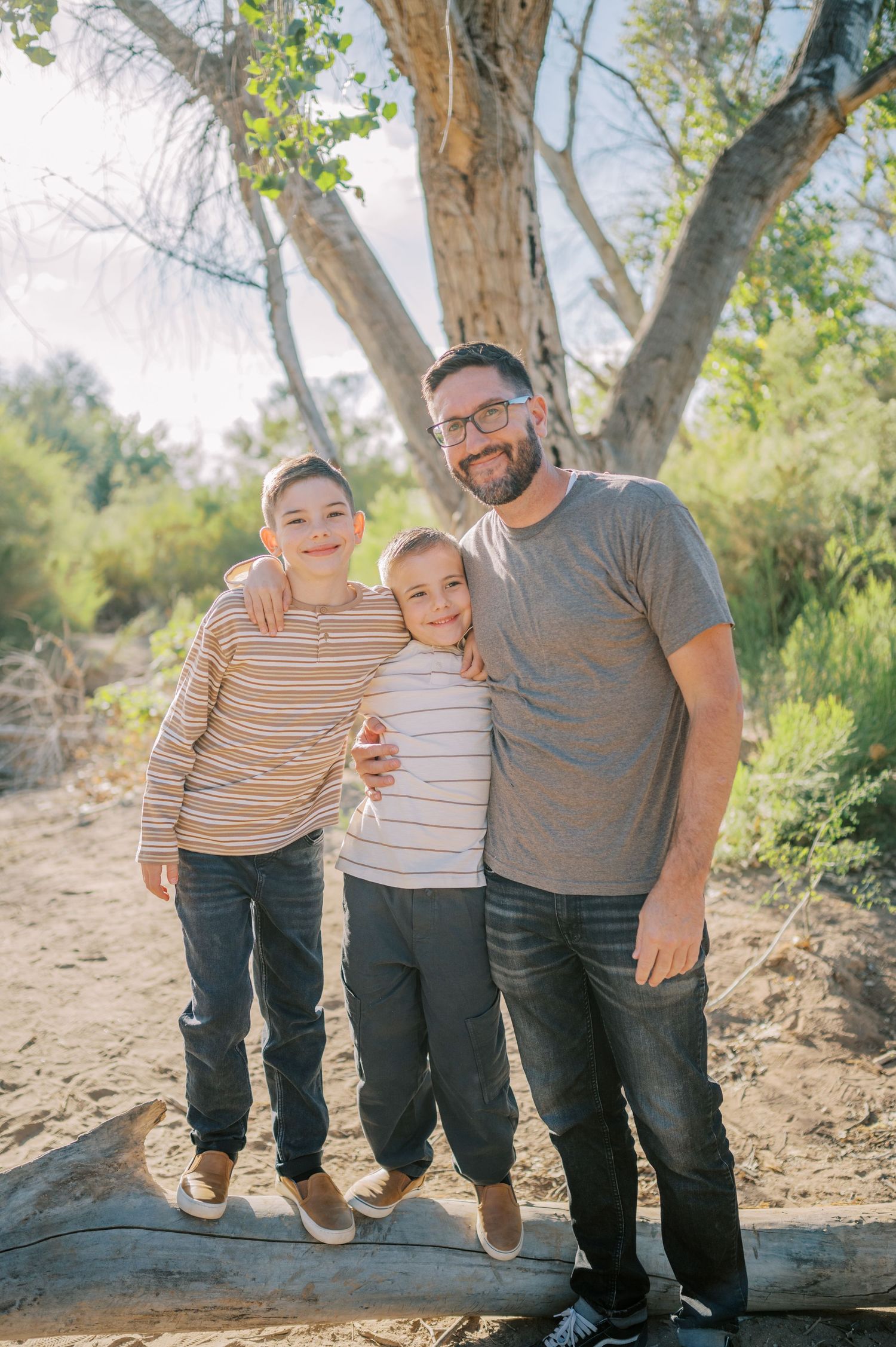 Luxury Gilbert Arizona family photography surrounded by lush greenery. A relaxed, stress-free experience that captures real connection.