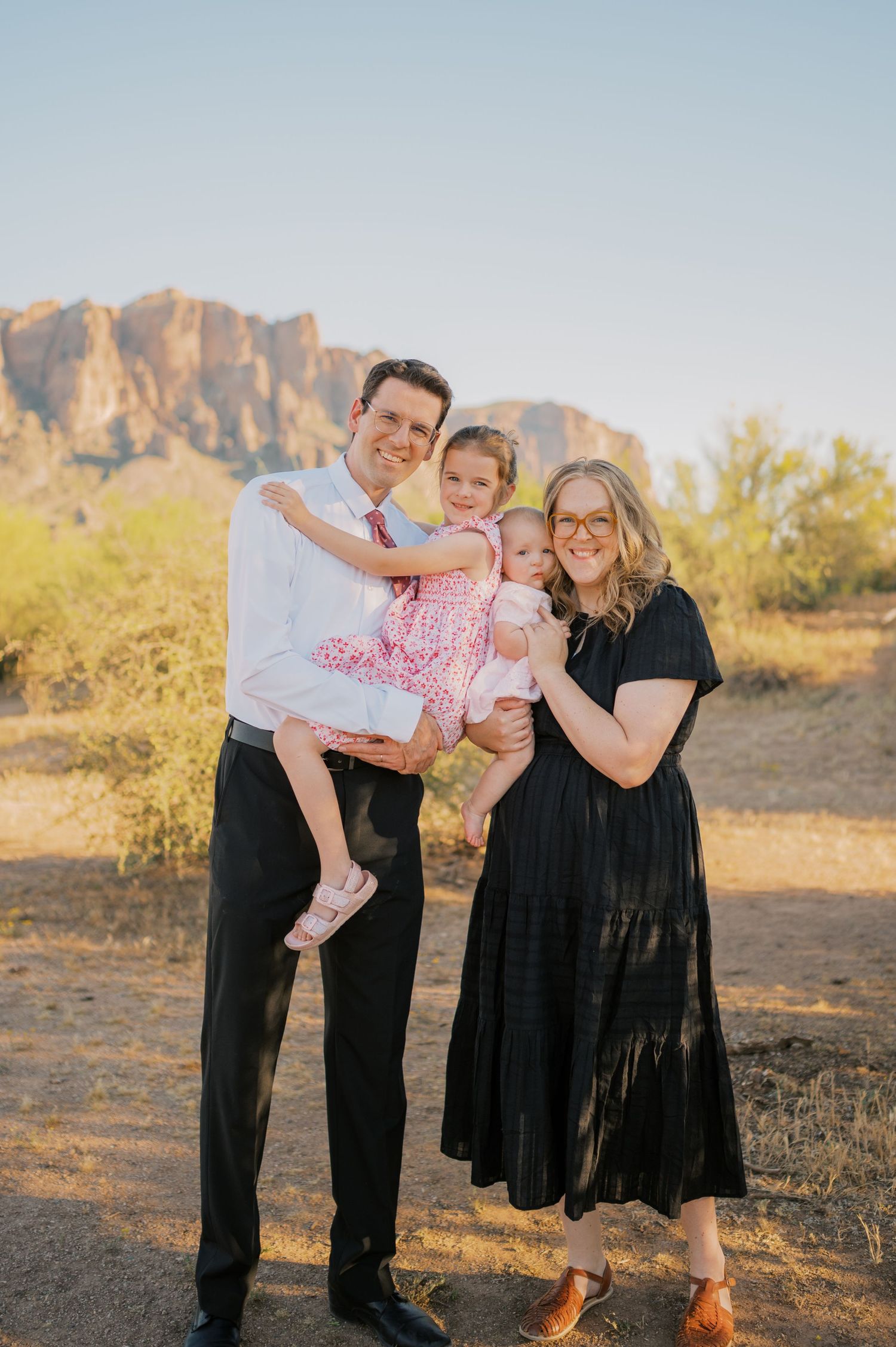 Family portrait in Arizona desert with superstition mountains
