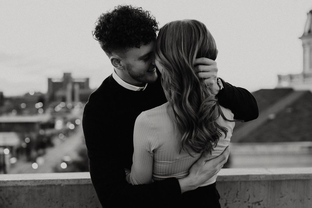 Black and white romantic portraits showing tender moments between a couple.