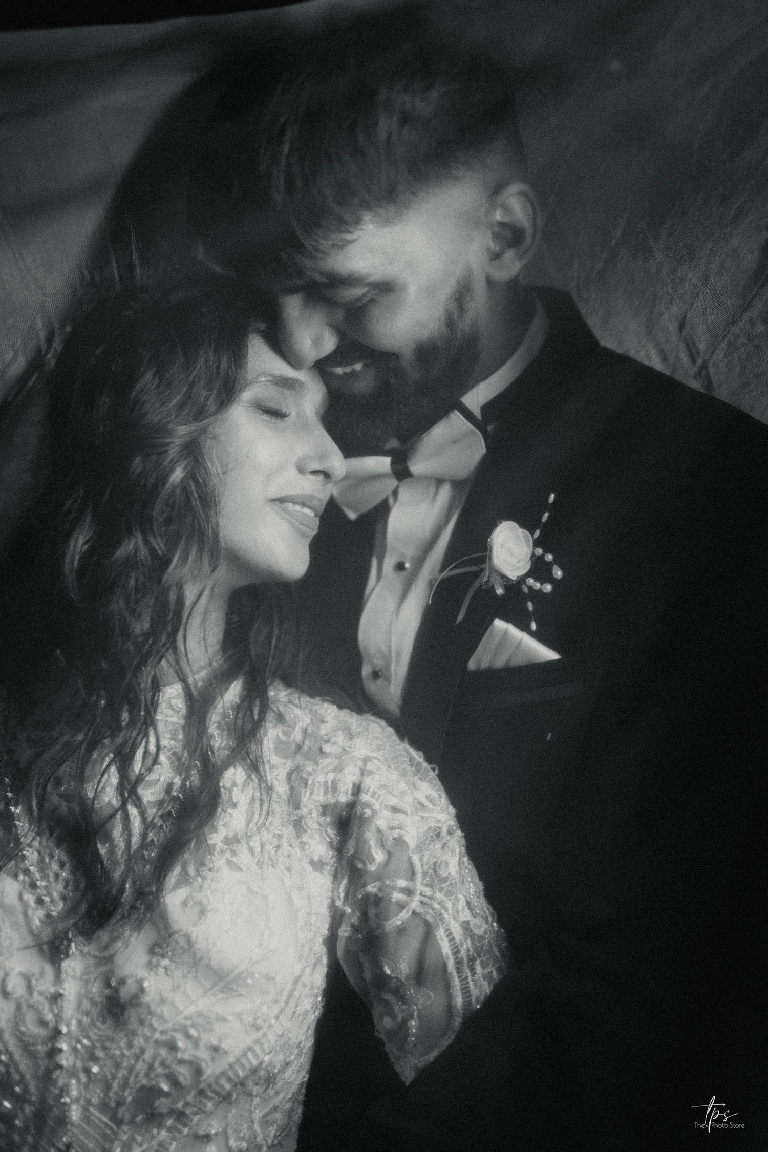 Romantic black and white portrait of newlyweds sharing an intimate moment, captured by a wedding Photographer in Mumbai,Wedding photographer