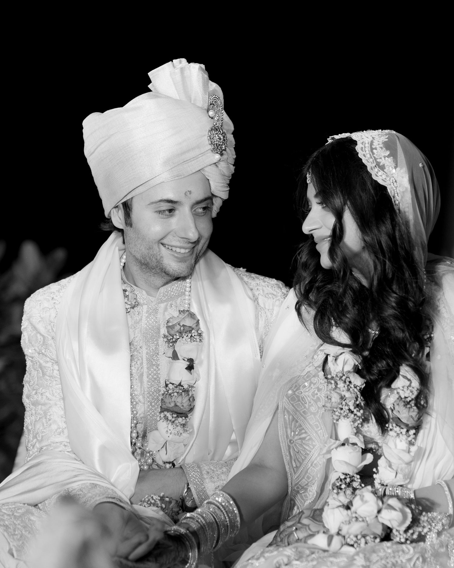 Stunning black & white candid wedding ceremony shots by a trusted wedding photographer near me in Mumbai.