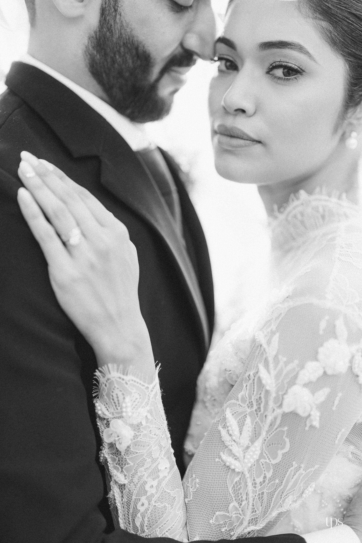 Stunning black & white bridal lace portraits beautifully shot by a trusted wedding photographer near me in Mumbai.