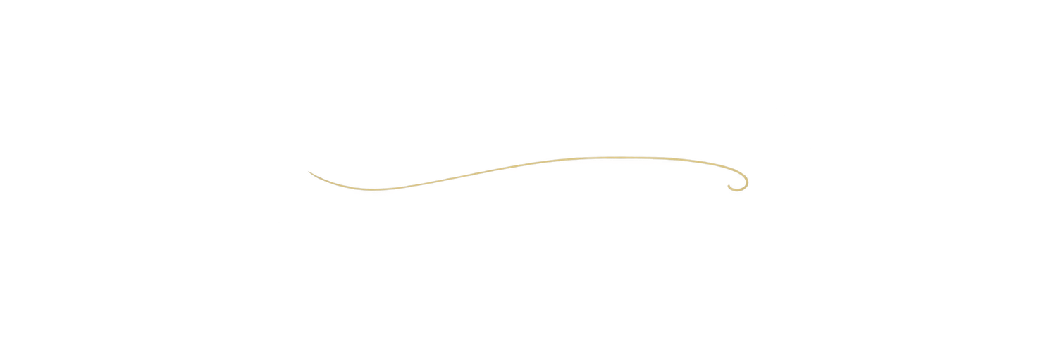 A delicate golden decorative divider line with an elegant curl at the end on a white background.