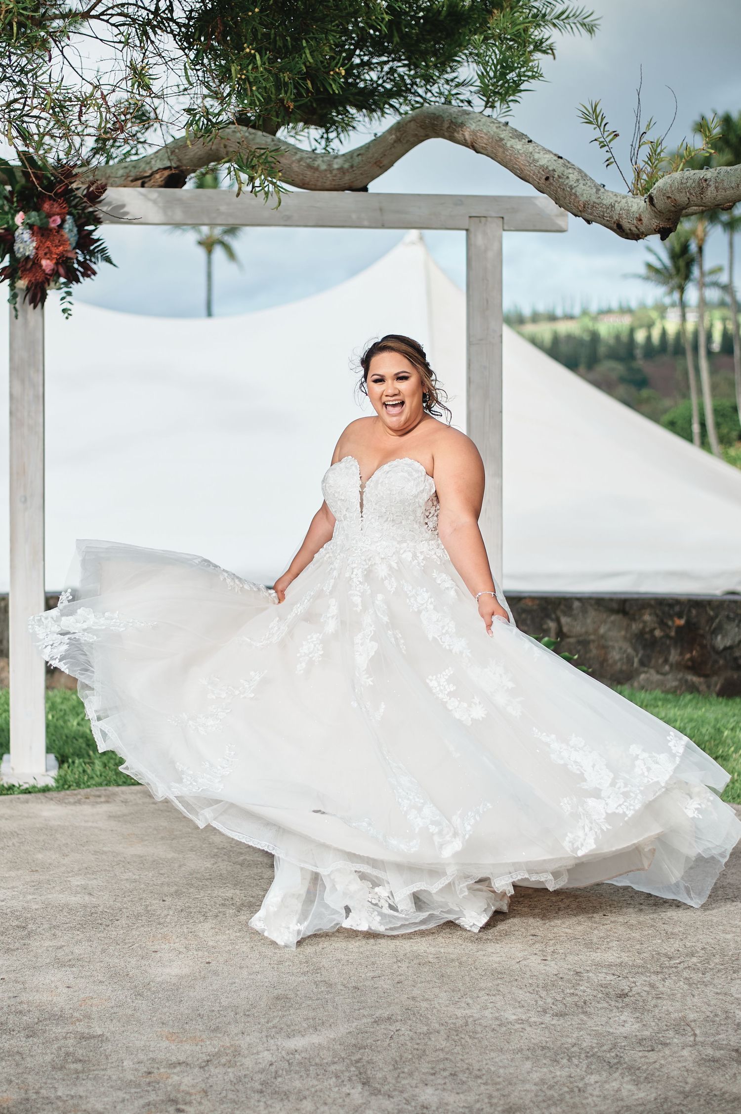 Flowing white wedding dress twirls dramatically in a series of outdoor photos.