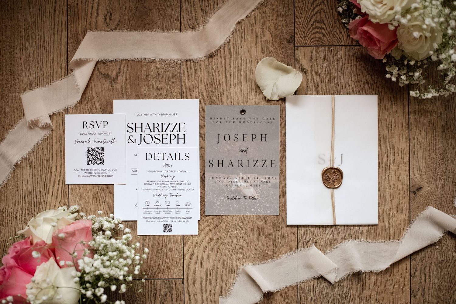 Flat lay of wedding invitation suite for Joseph and Sharizze with flowers and ribbon.