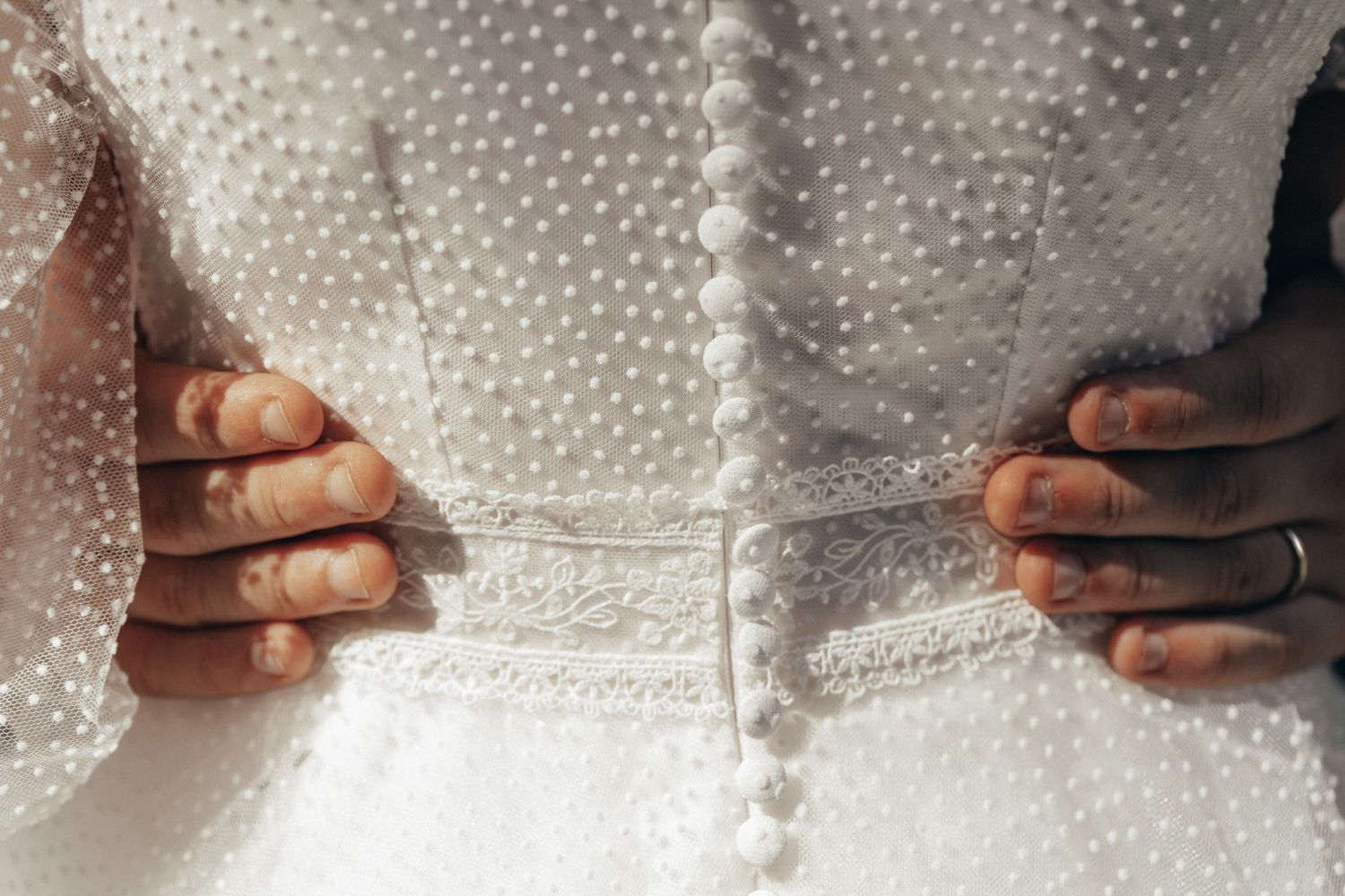details of wedding dress during wedding photoshoot