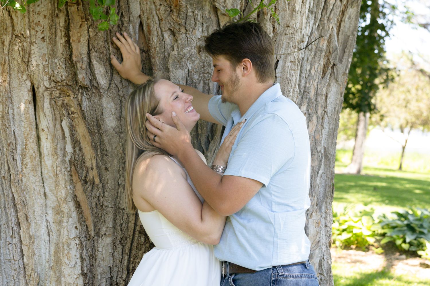 Couple laughing together during a candid photography session