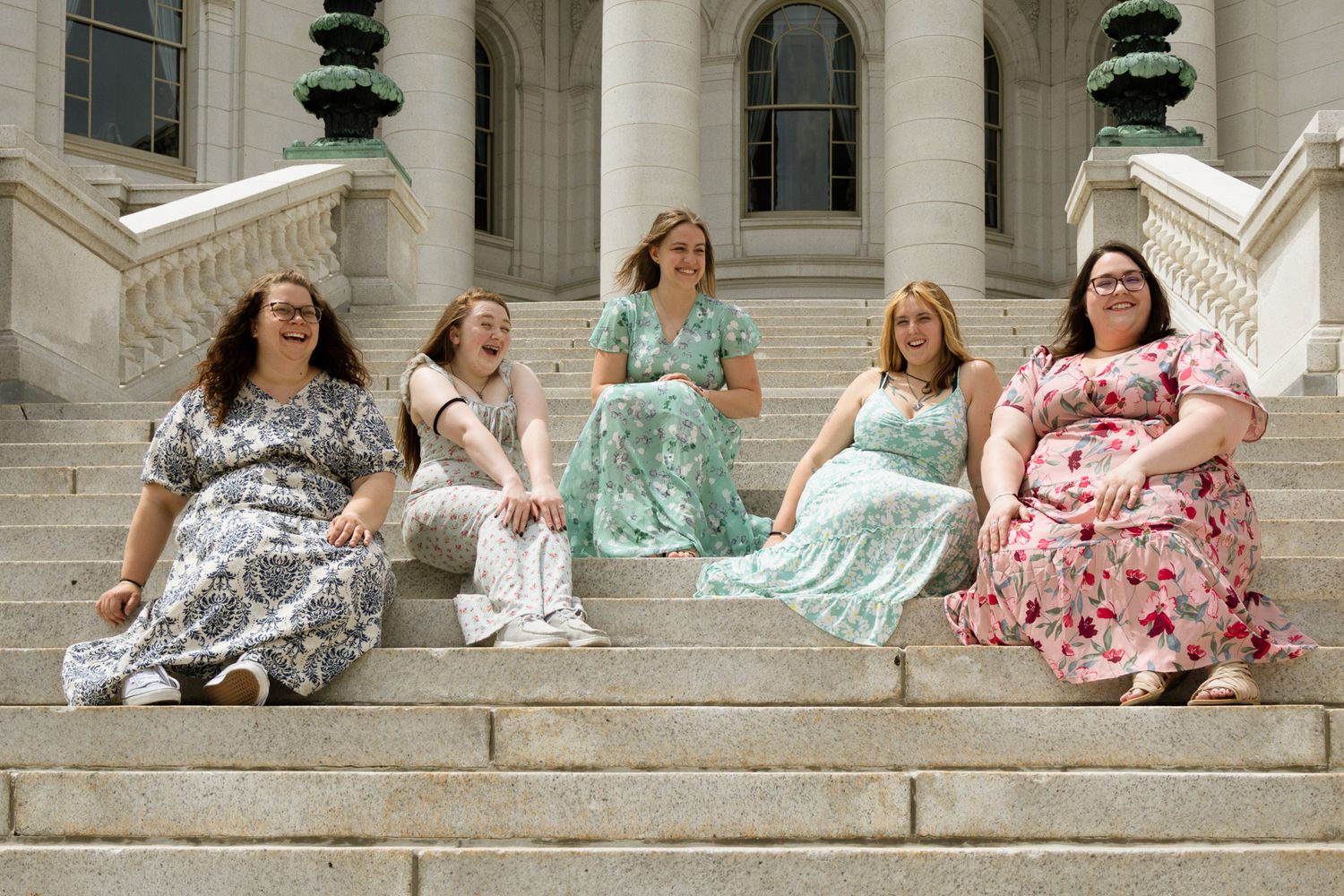 Bachelorette photos featuring the bride in the middle with bridesmaids around her.
