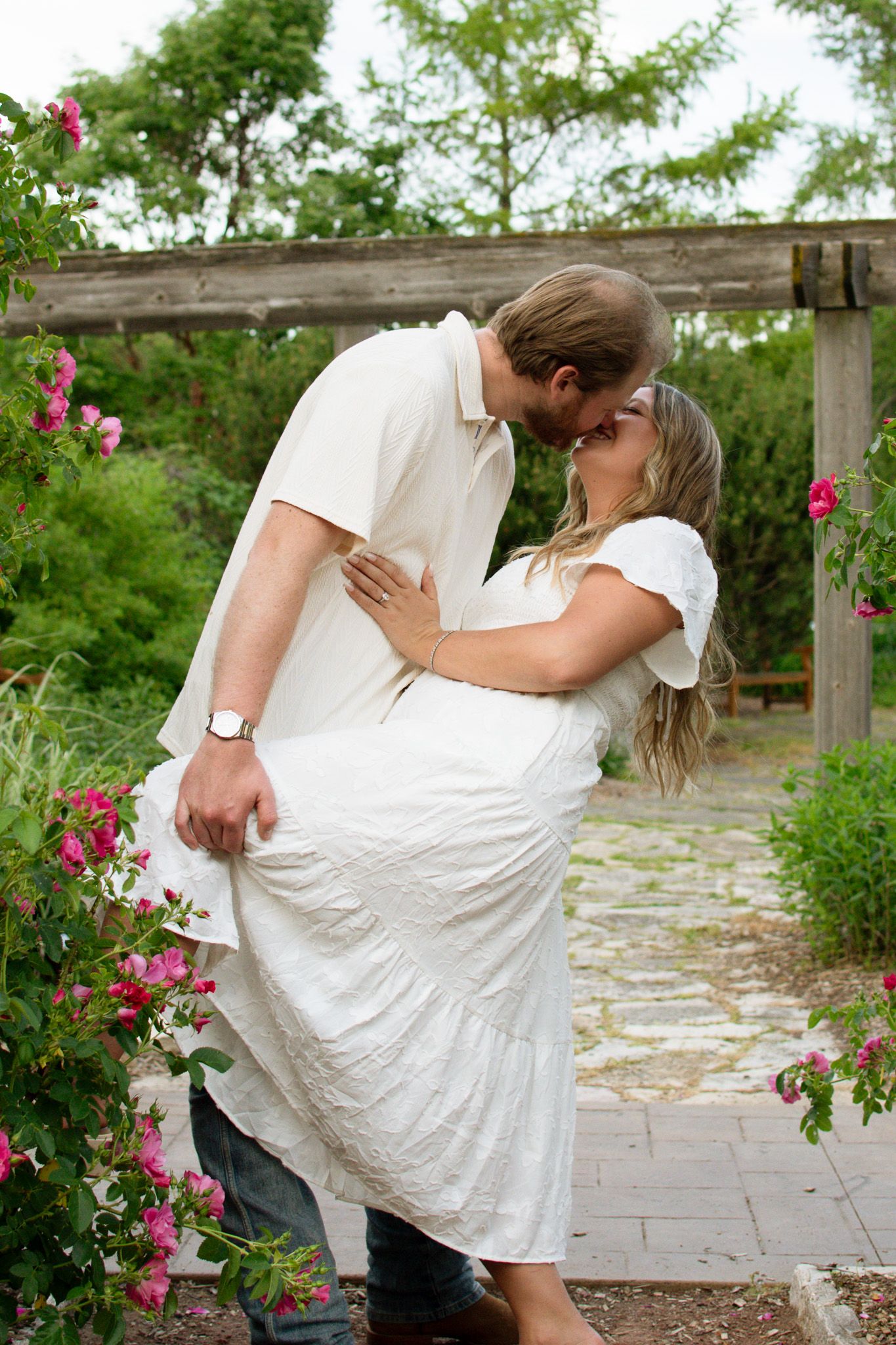 Couple kissing during an outdoor photography session