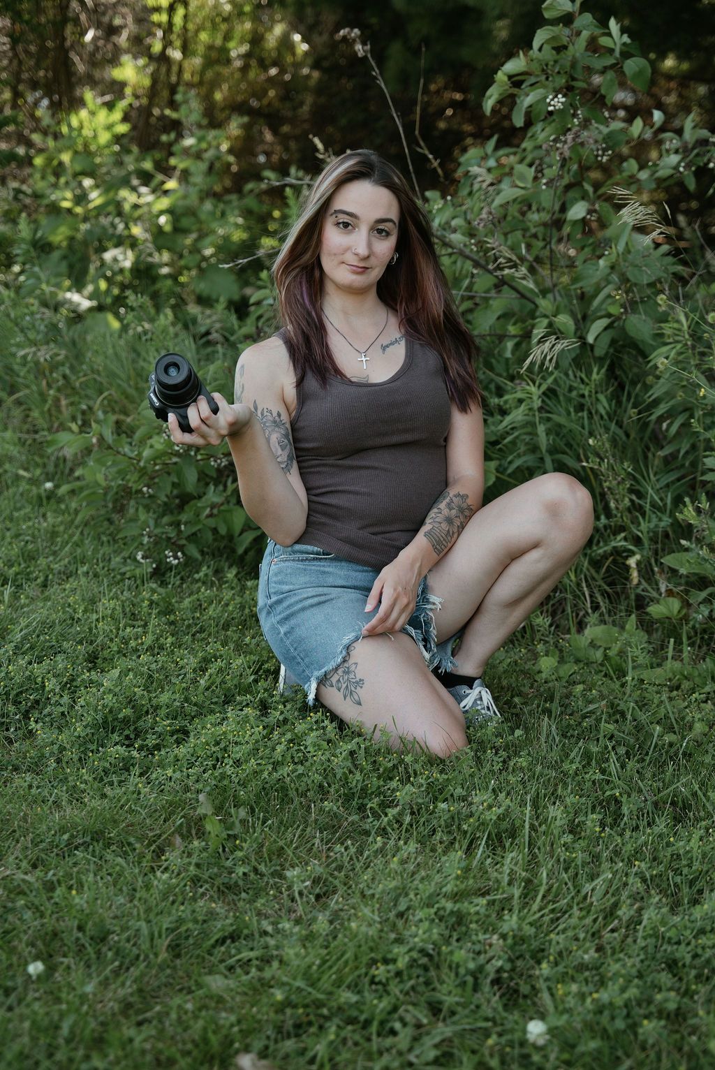 Appleton Wisconsin photographer holding a camera