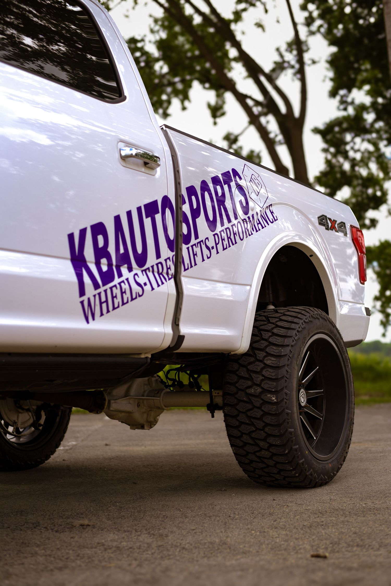 White Ford F150 truck with KBAutoSports logo for a branding session.