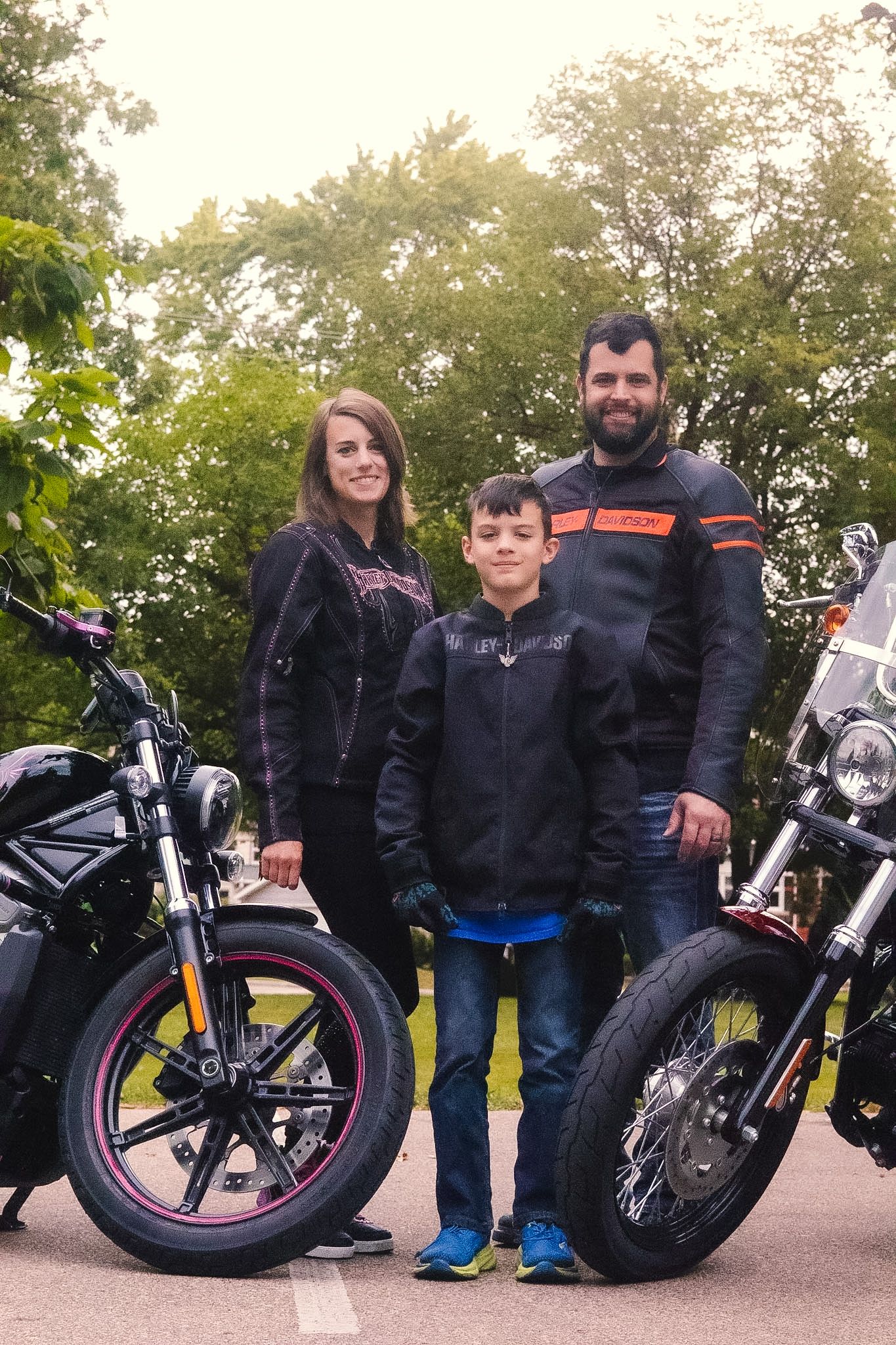 Family with motorcycles during an outdoor photography session