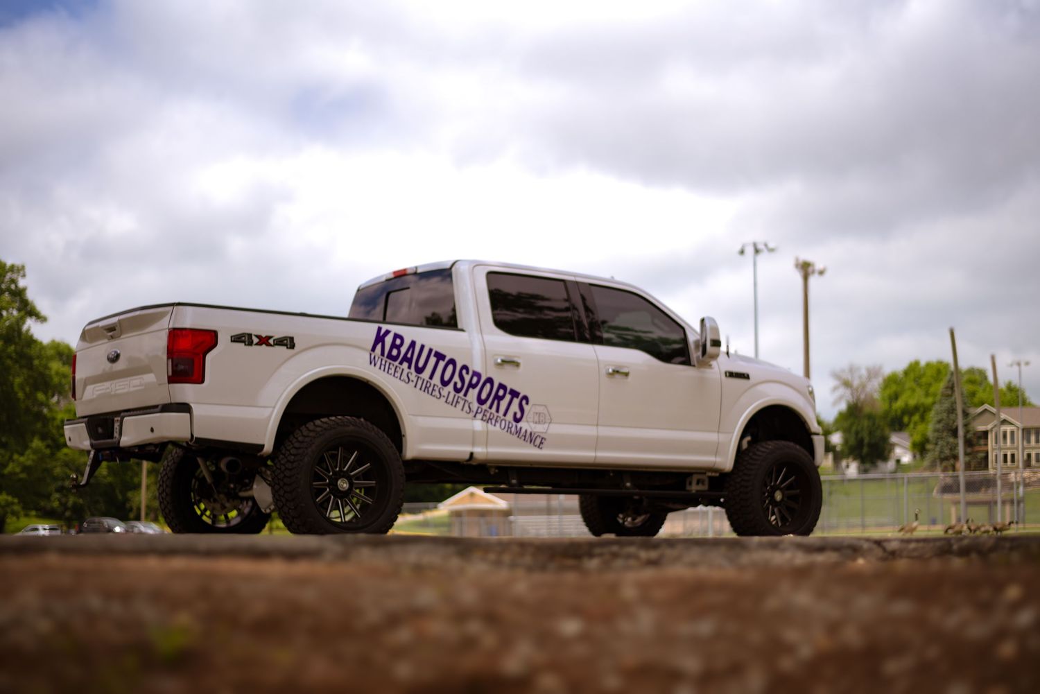 White Ford F150 truck with KBAutoSports logo for a branding session.