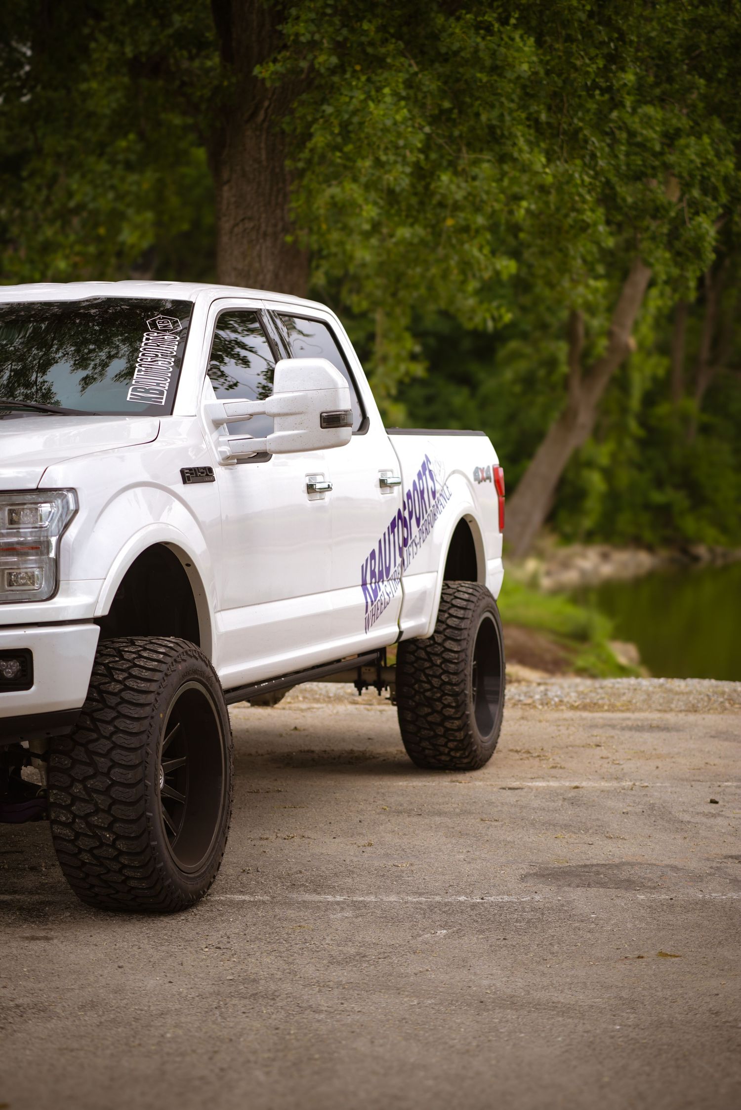 White Ford F150 truck with KBAutoSports logo for a branding session.
