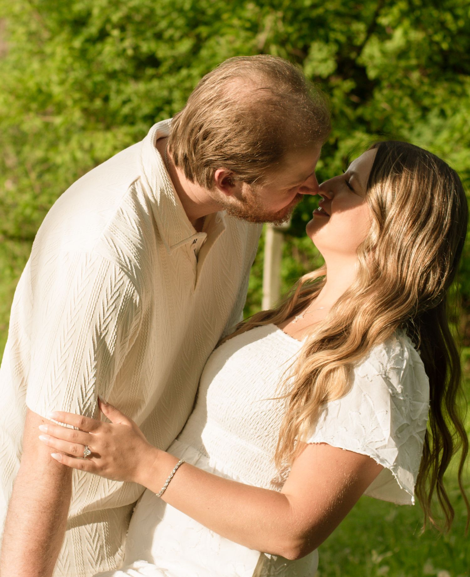Couple kissing during an outdoor photography session