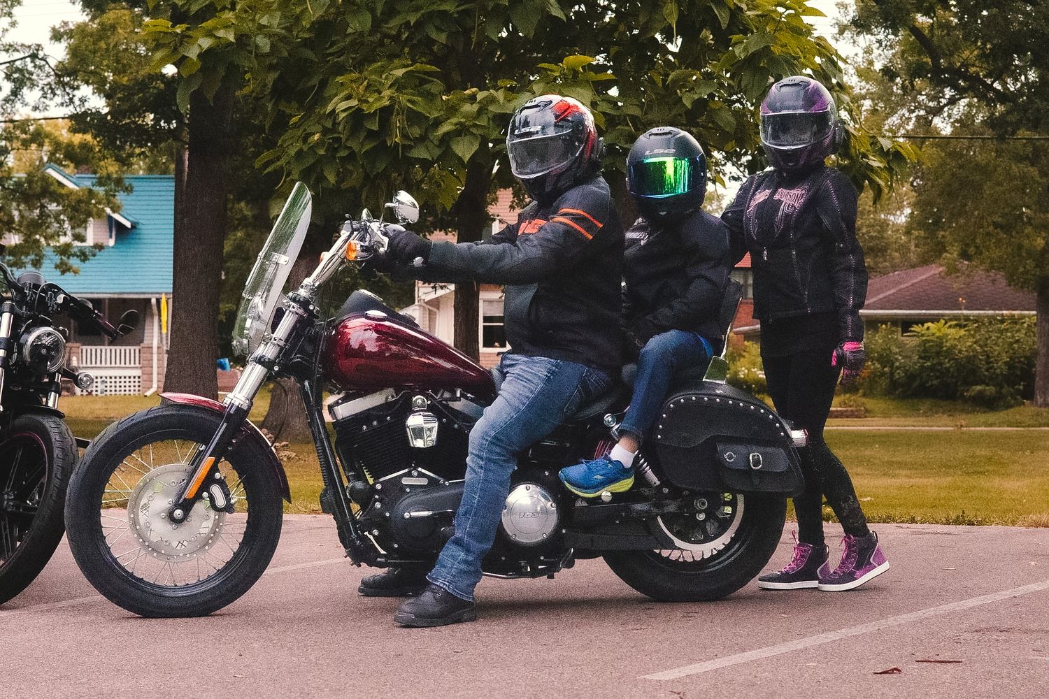Family with motorcycles during an outdoor photography session