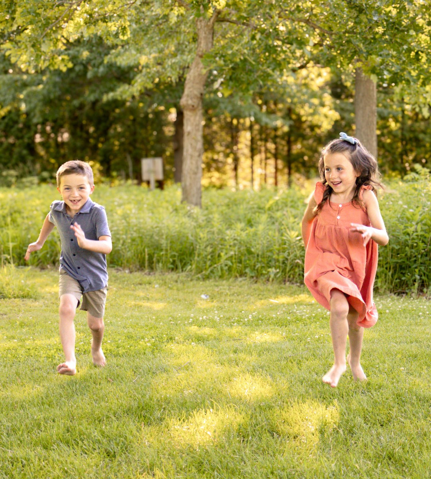 Children playing together during a family photography session