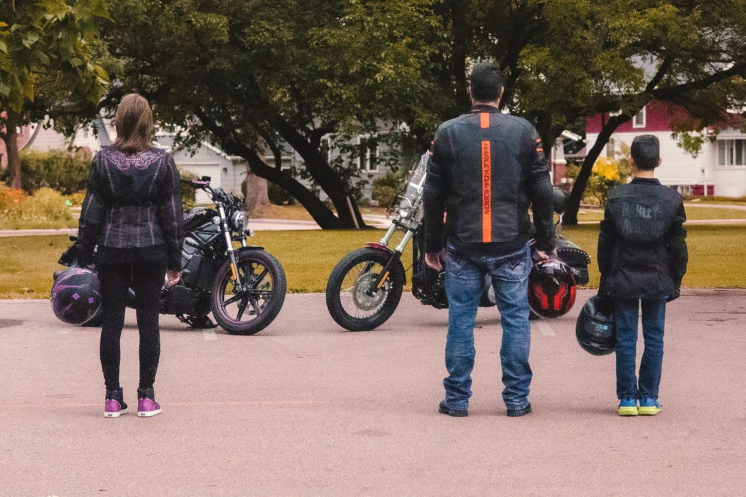 Family with motorcycles during an outdoor photography session