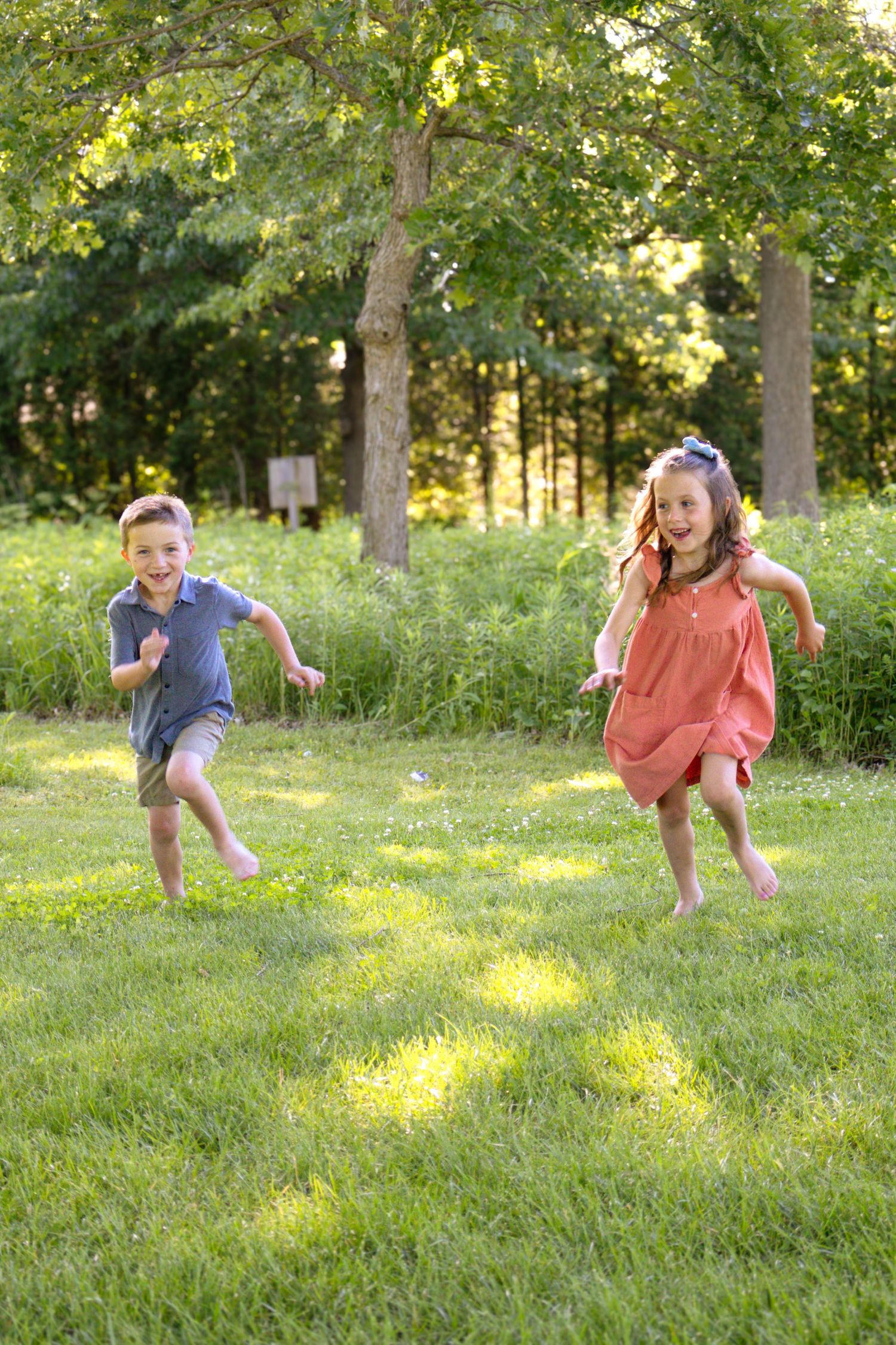 Children playing together during a family photography session