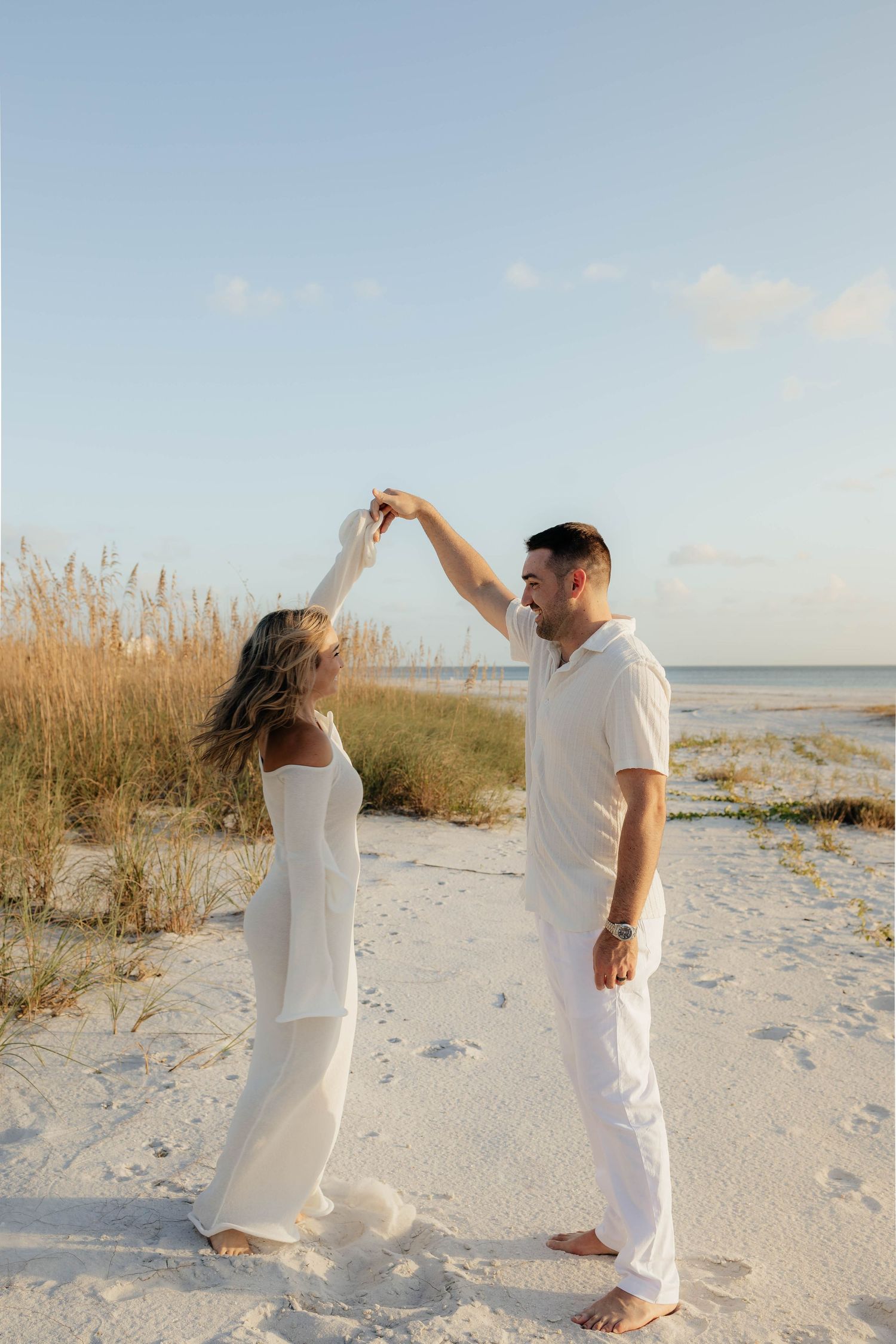 Couple photo session at sunset at Fort Myers Beach
