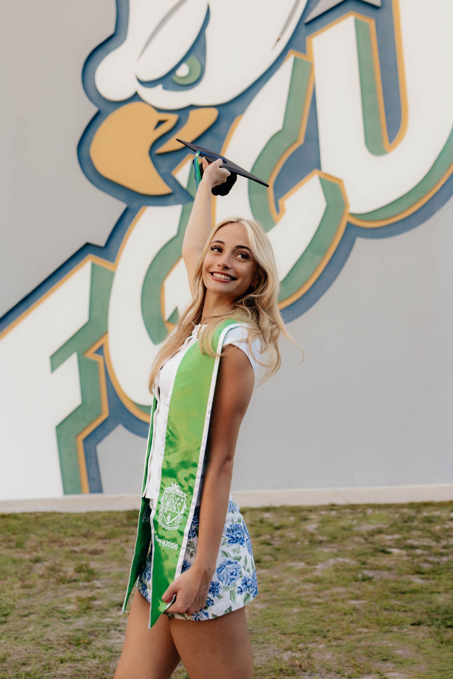 graduation photography Fgcu baseball field