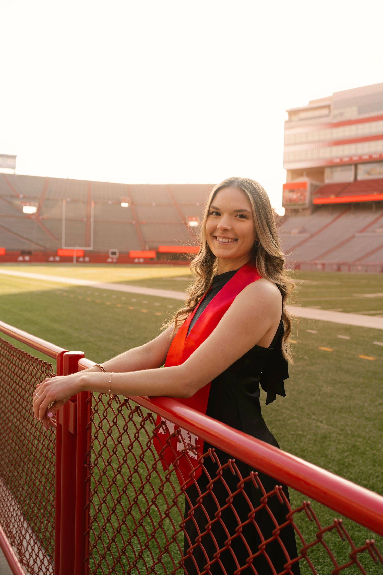 graduation photography at football field