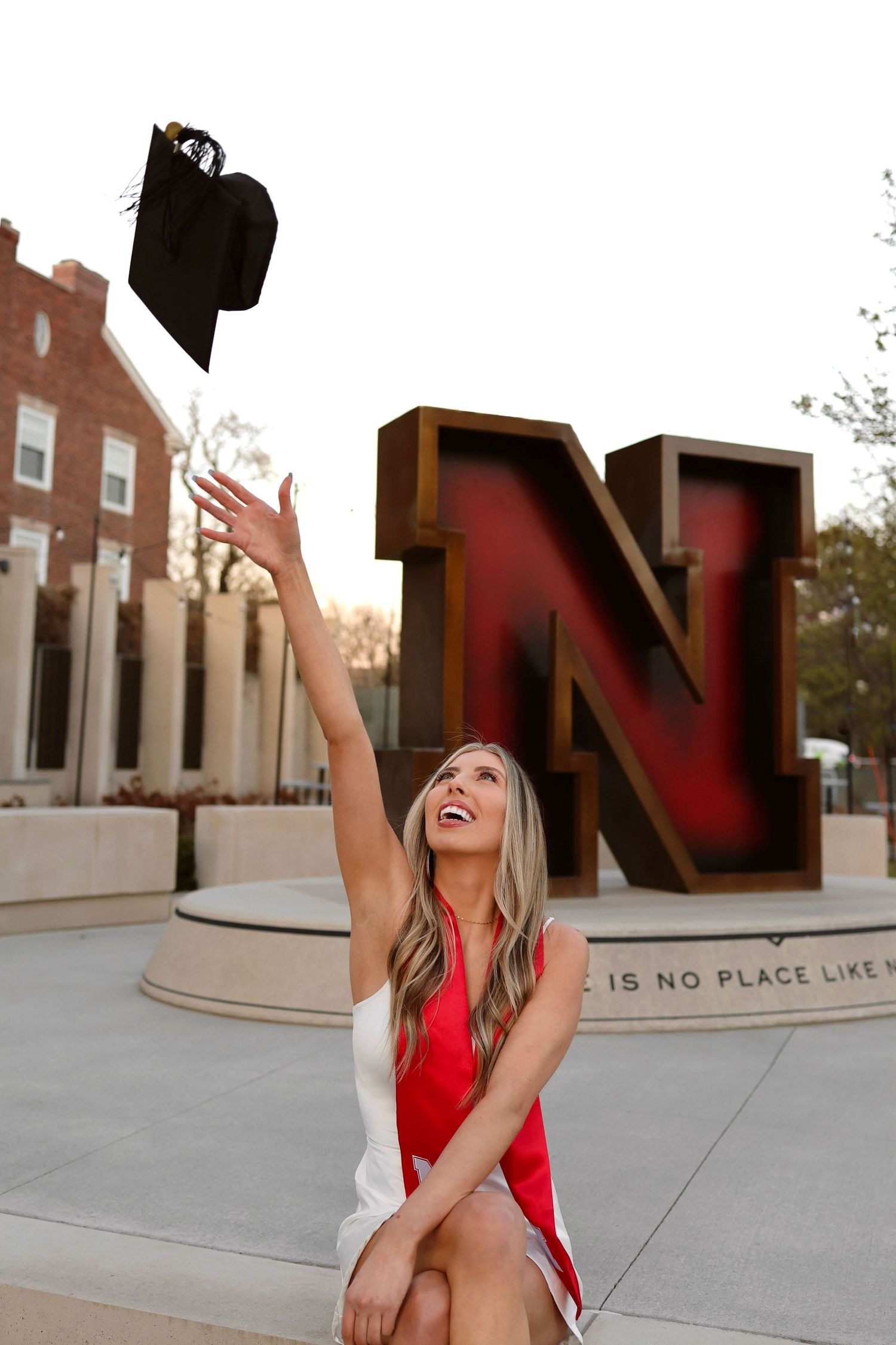 graduation photography throwing cap