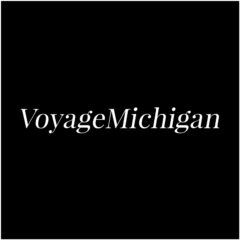 VoyageMichigan publication logo in white serif font on a bold black background.