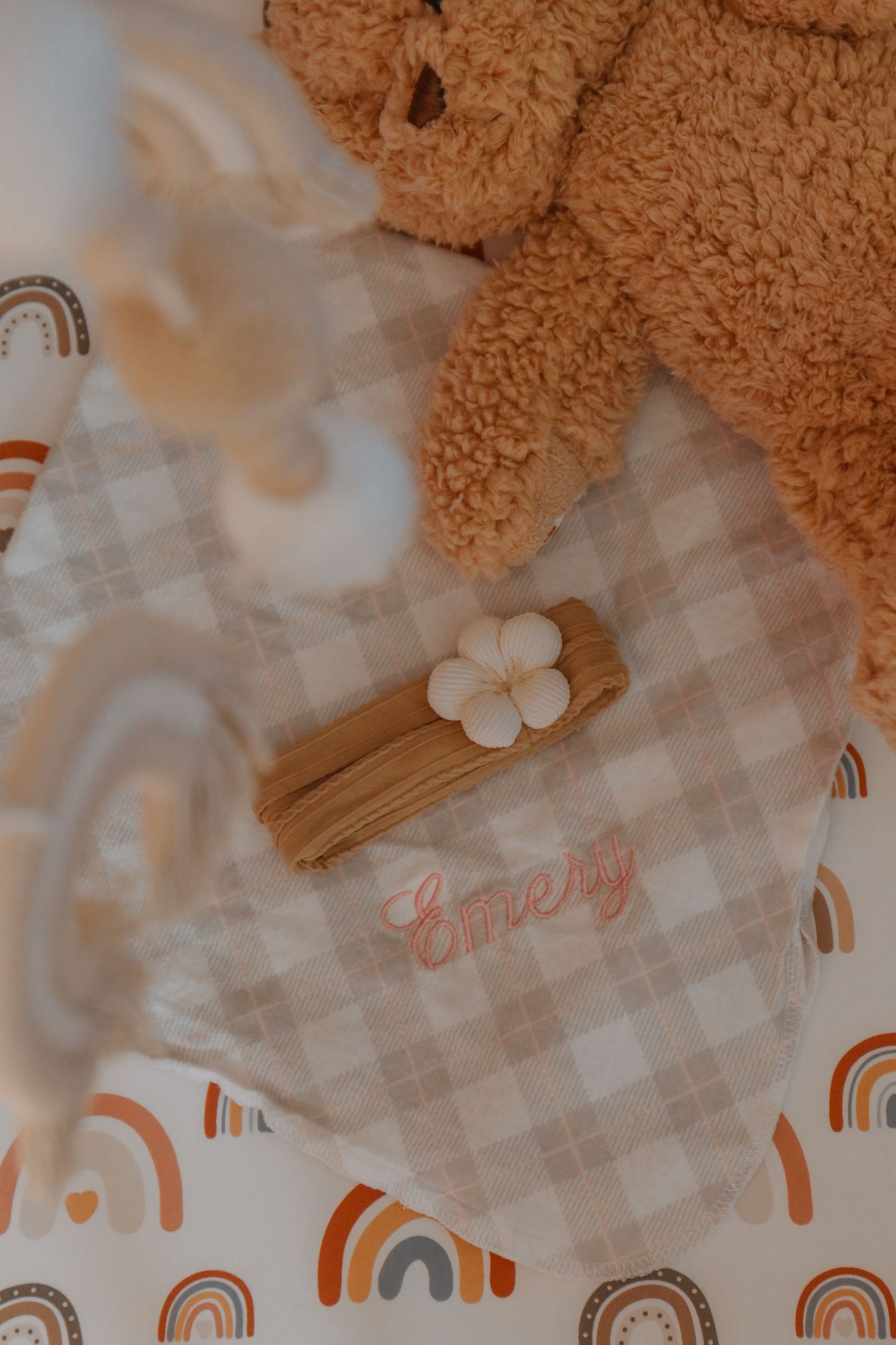 Kawartha Lakes Newborn Photography Session.
Close up detail photo of newborn baby girl accessories in crib