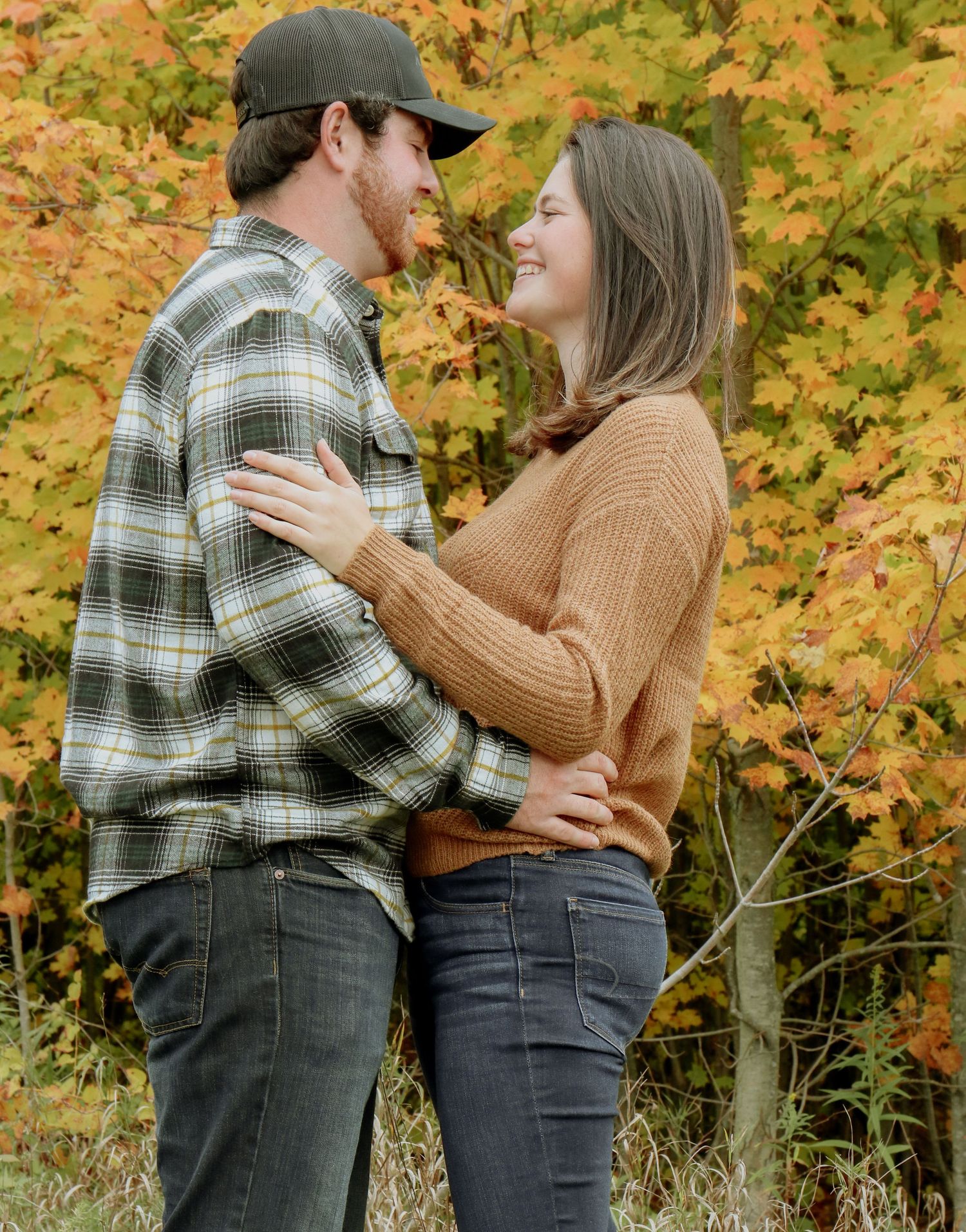 Kawartha Lakes Couple Photography Session.
Boyfriend and girlfriend hugging while looking into eachothers eyes