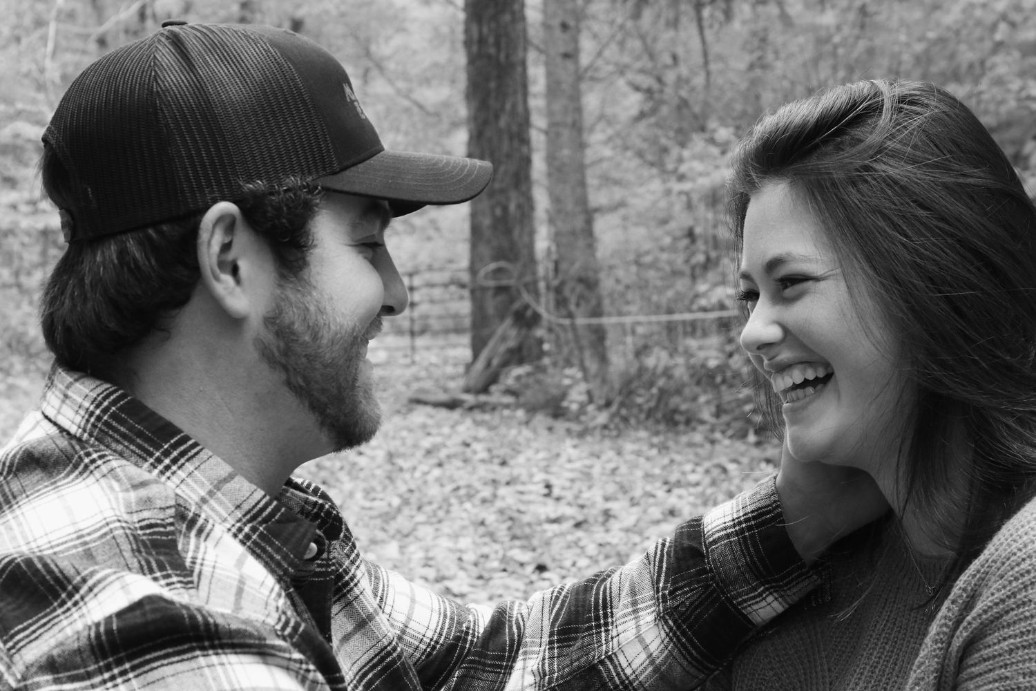 Kawartha Lakes Couple Photography Session.
Boyfriend and girlfriend sitting on a blanket together in an open field in the fall