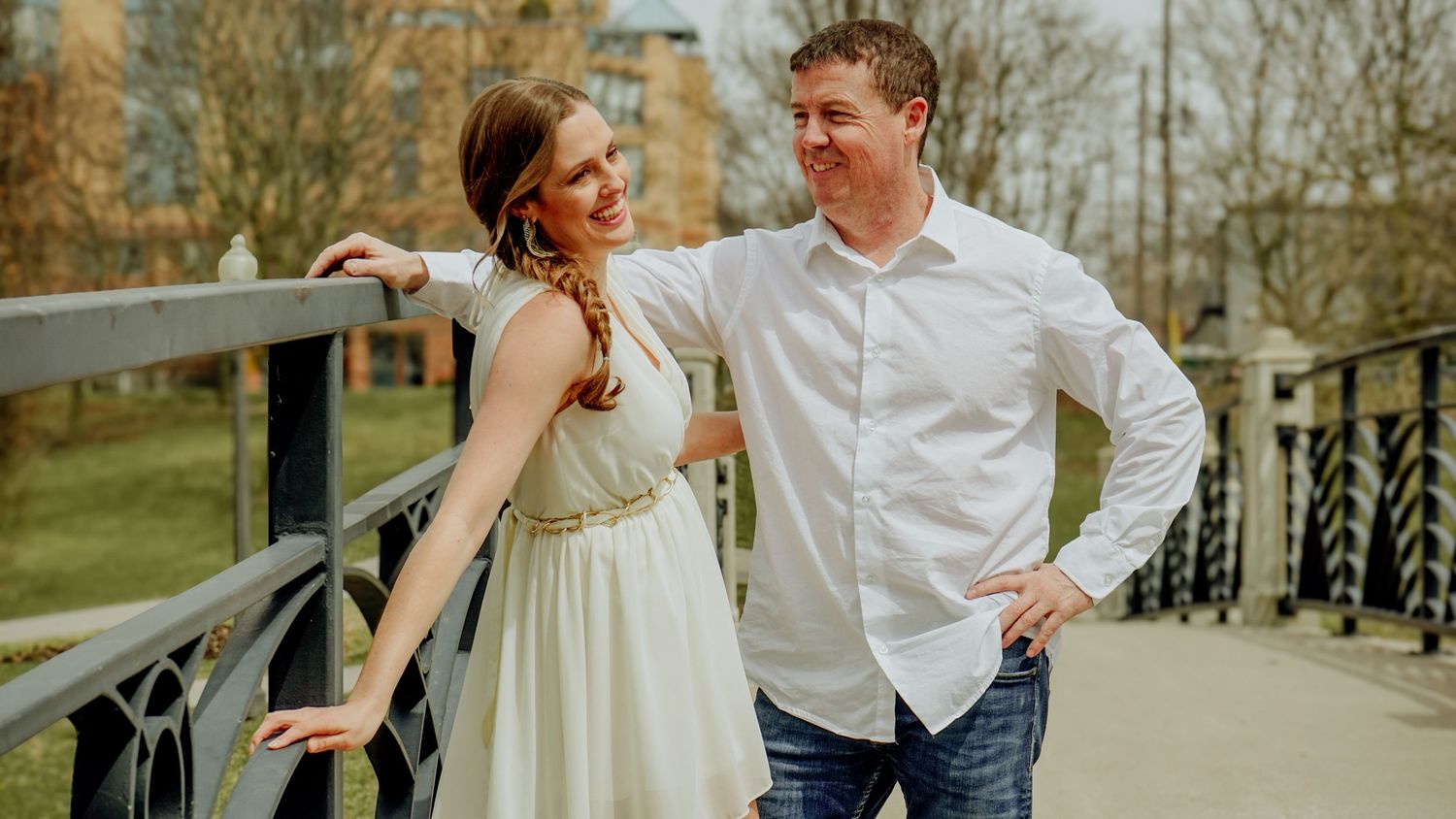 Kawartha Lakes Couples Engagement Photography Session.
Fiancé and fiancée laughing and smiling together standing on a bridge