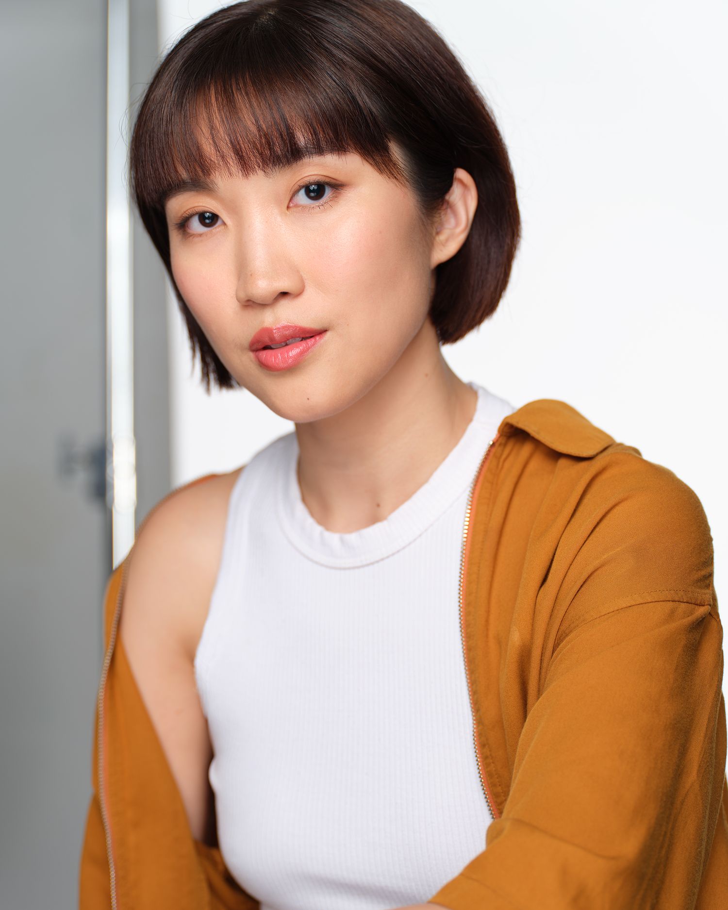 NYC actor headshot on white background.