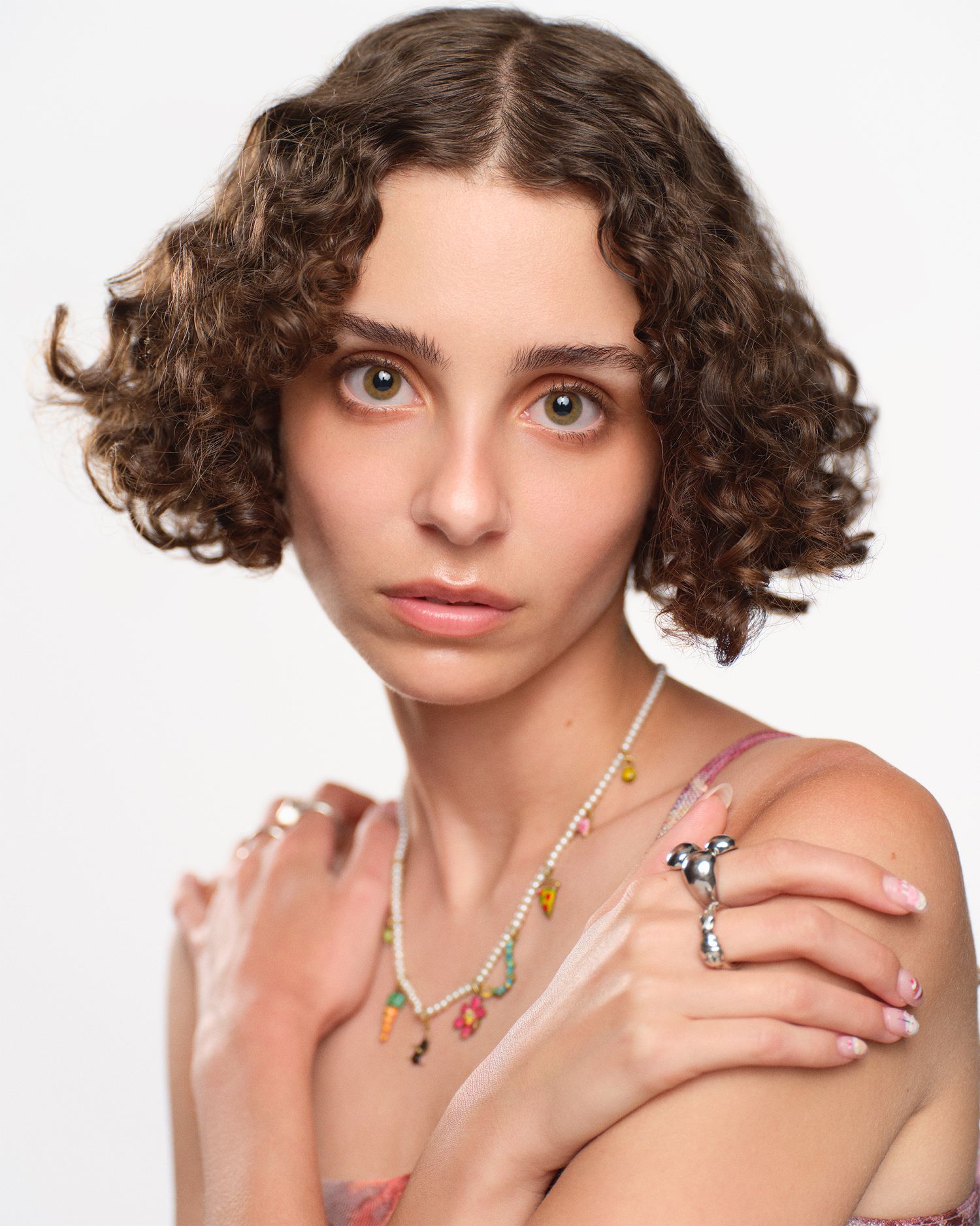Bright headshot look for a woman with cool styling.