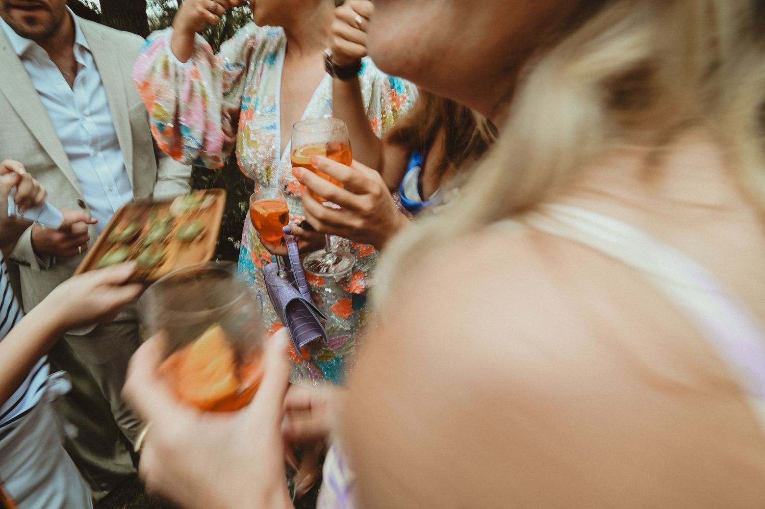 Guests enjoying cocktails and refreshments during the wedding celebration.