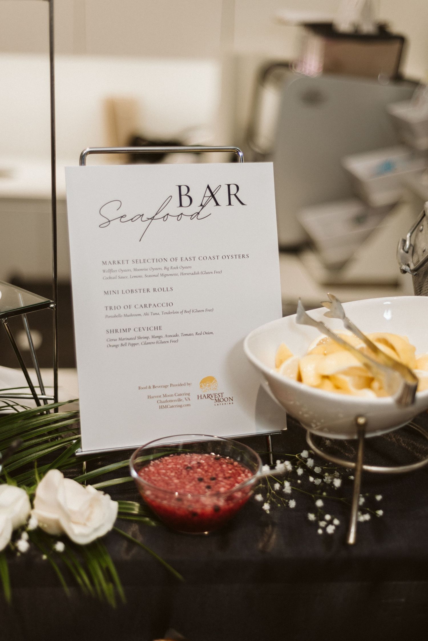 Close up of seafood bar menu cards with appetizer displays.